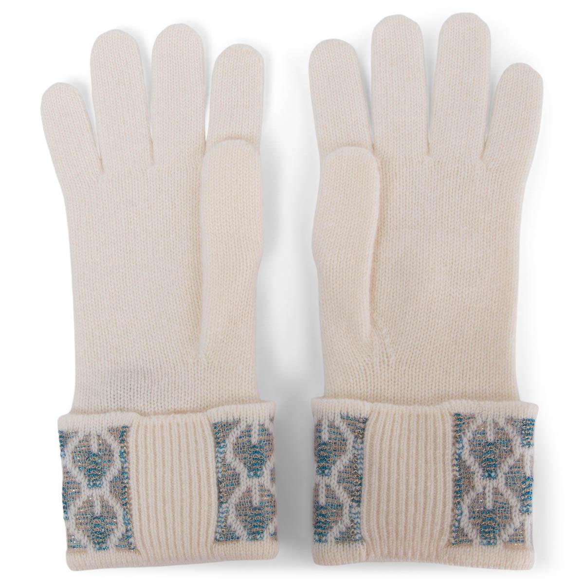 100% authentic Chanel CC gloves in off-white cashmere (95%), viscose (2%), cotton (1%) and bue metallised fibre (1%). Have been worn and are in excellent condition. 

Measurements
Middle Finger to Wrist	27cm (10.5in)
Middle Finger	7cm