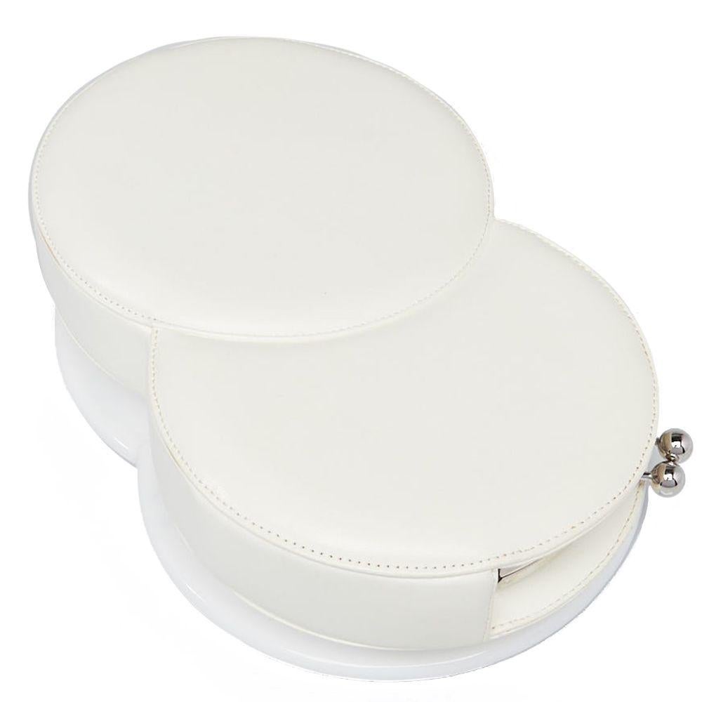Crafted in Italy from an intricate combination of radiant white lambskin leather and shiny plexi-glass, this elegant, restaurant-inspired clutch bag from the Chanel 2015 Fall/Winter Runway collection features a unique conjoined dining plate set