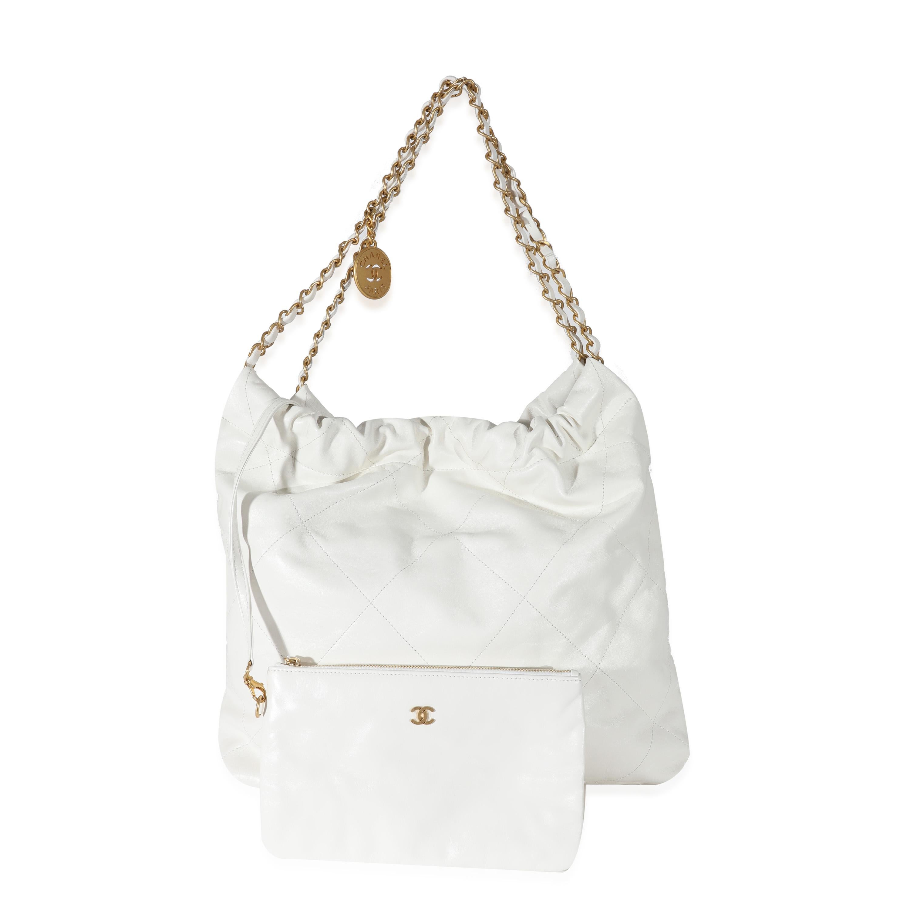 Listing Title: Chanel White Calfskin Chanel 22 Bag
SKU: 130692
Condition: Pre-owned 
Handbag Condition: Very Good
Condition Comments: Item is in very good condition with minor signs of wear. Plastic at some hardware. Exterior corner scuffing and