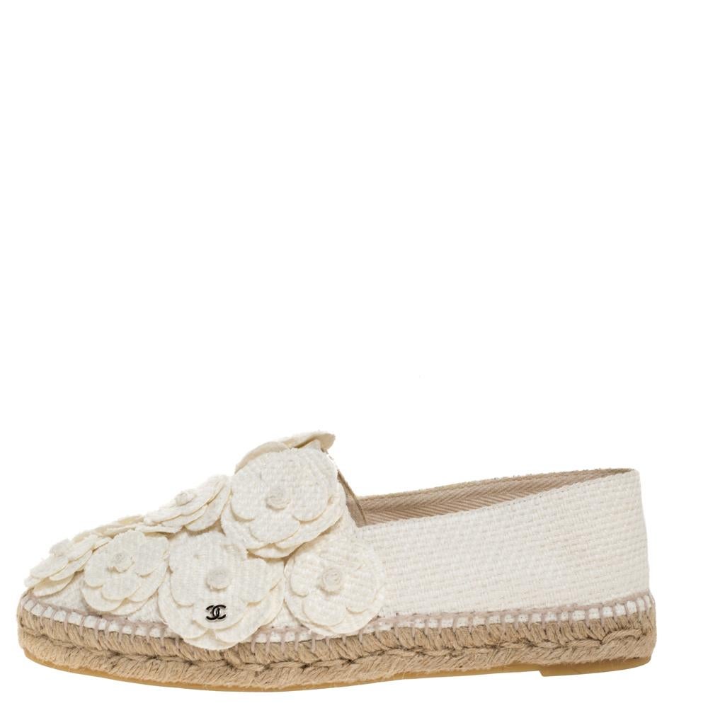 Espadrilles are not just stylish, but also comfortable and easy to wear. This lovely pair from Chanel will accompany a casual outfit with perfection. They are made of canvas and detailed with Camellia appliques on the uppers.

