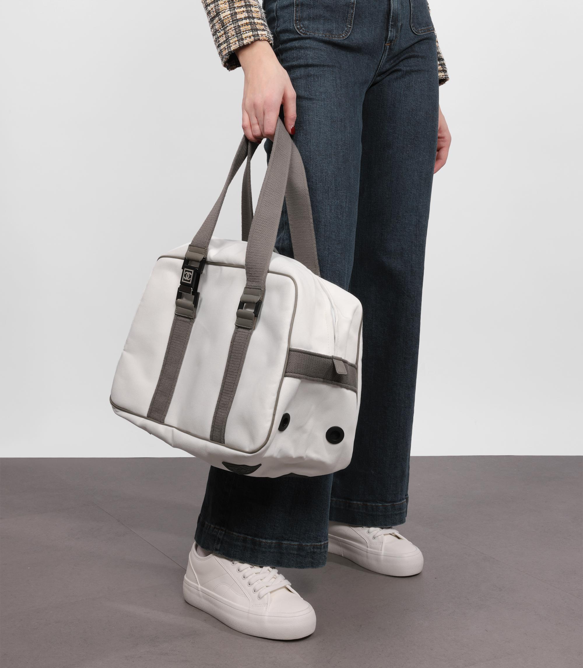Chanel White Canvas Vintage Sports Line Boston 40

Brand- Chanel
Model- Sports Line Boston 40
Product Type- Tote
Serial Number- 96*****
Age- Circa 2004
Accompanied By- Chanel Dust Bag
Colour- White
Hardware- Silver
Material(s)- Canvas
Authenticity