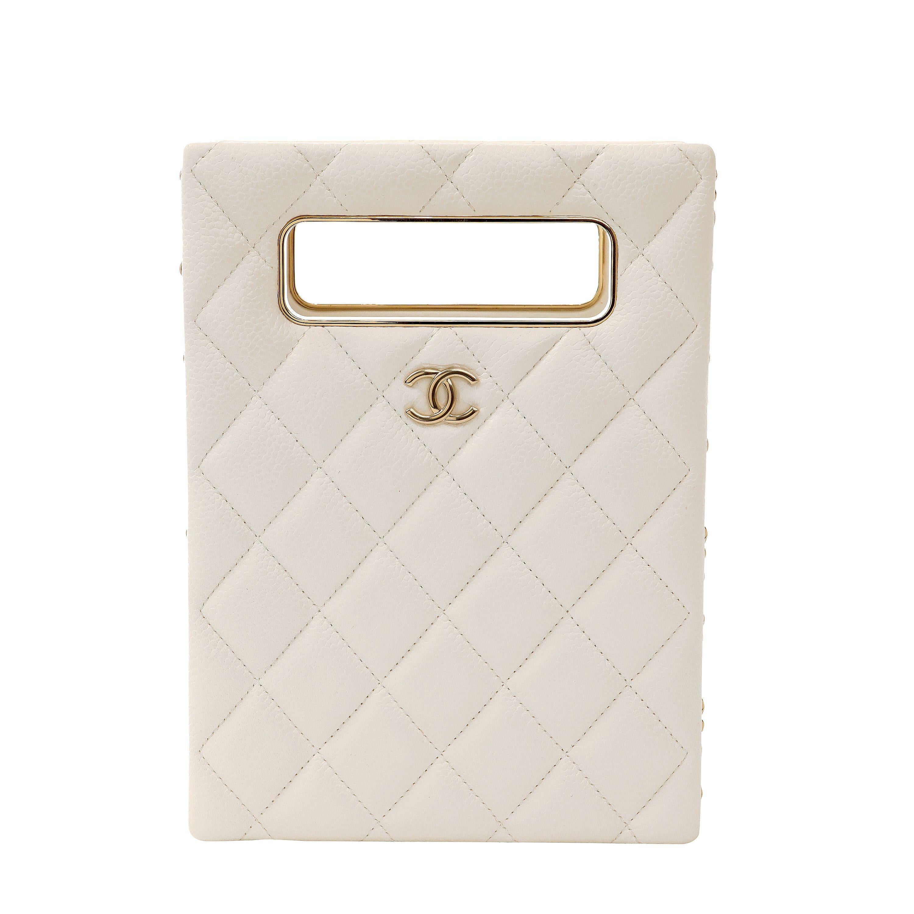
This authentic Chanel White Caviar Matelasse Crossbody bag is in pristine condition.  From Chanel’s Spring/ Summer 2022 collection, this elegant crossbody bag is a must have. 
Textured white caviar leather is quilted in signature Chanel diamond