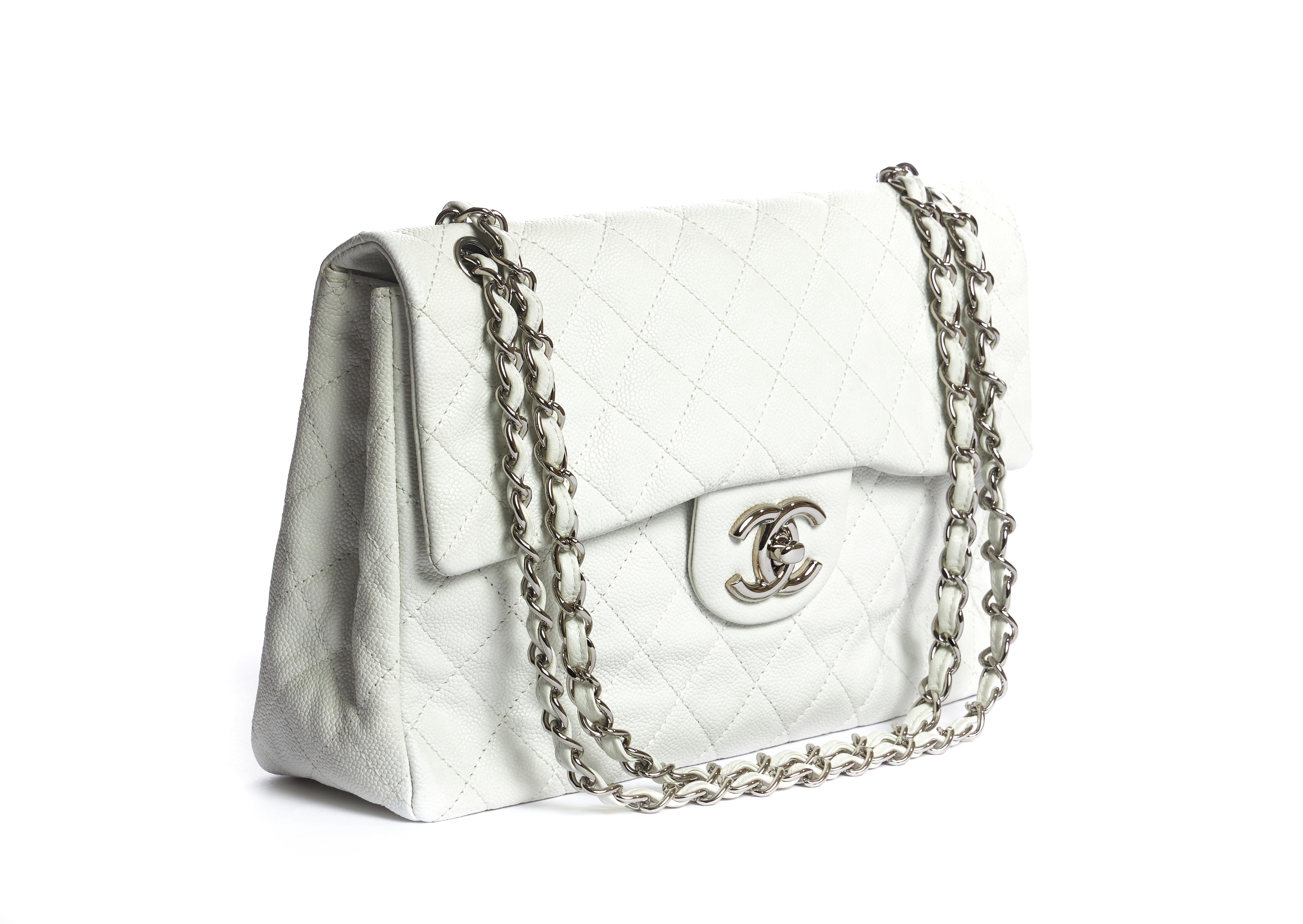 Chanel white caviar maxi single flap with silver tone hardware. Shoulder drop 12