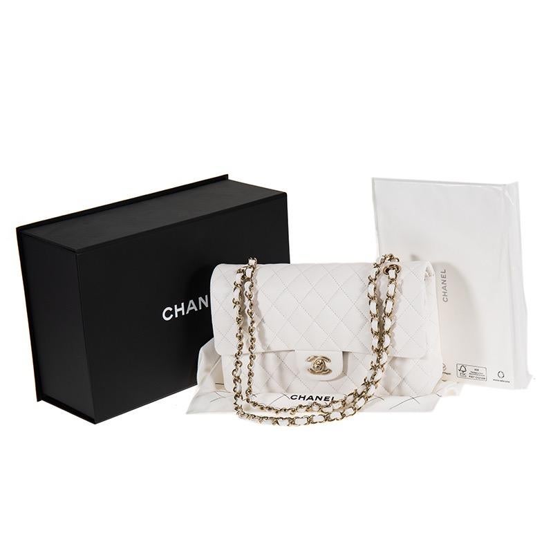 SKU 	AT-1620
Brand	Chanel
Model	Double Flap
Plaque Serial No.	GK******
Retail Price:   approx £8,530 / $10,200
_________________________________________
Color	White
Date	Approx. 2021
Metal	Light Gold
Material   Calfskin Leather
Measurements	Approx.