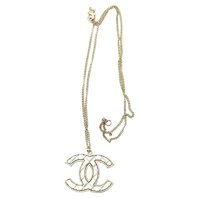 Chanel Black and Silver CC Crystal Heart Pendant Necklace in 2023