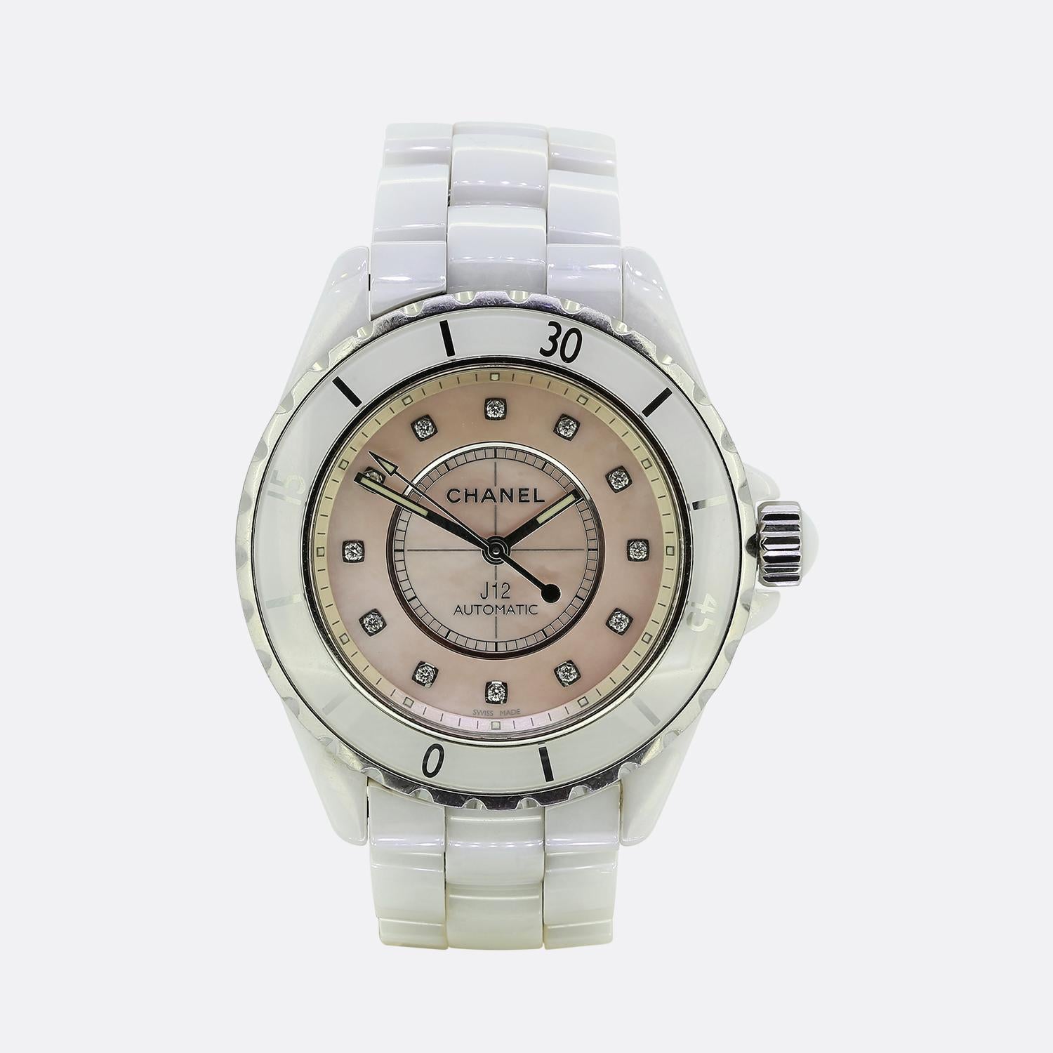 Here we have a white ceramic Chanel J12 automatic ladies wristwatch featuring a pink mother of pearl dial which features 12 round brilliant cut diamond time indications and silver hands with a luminescent fill. The watch also features a