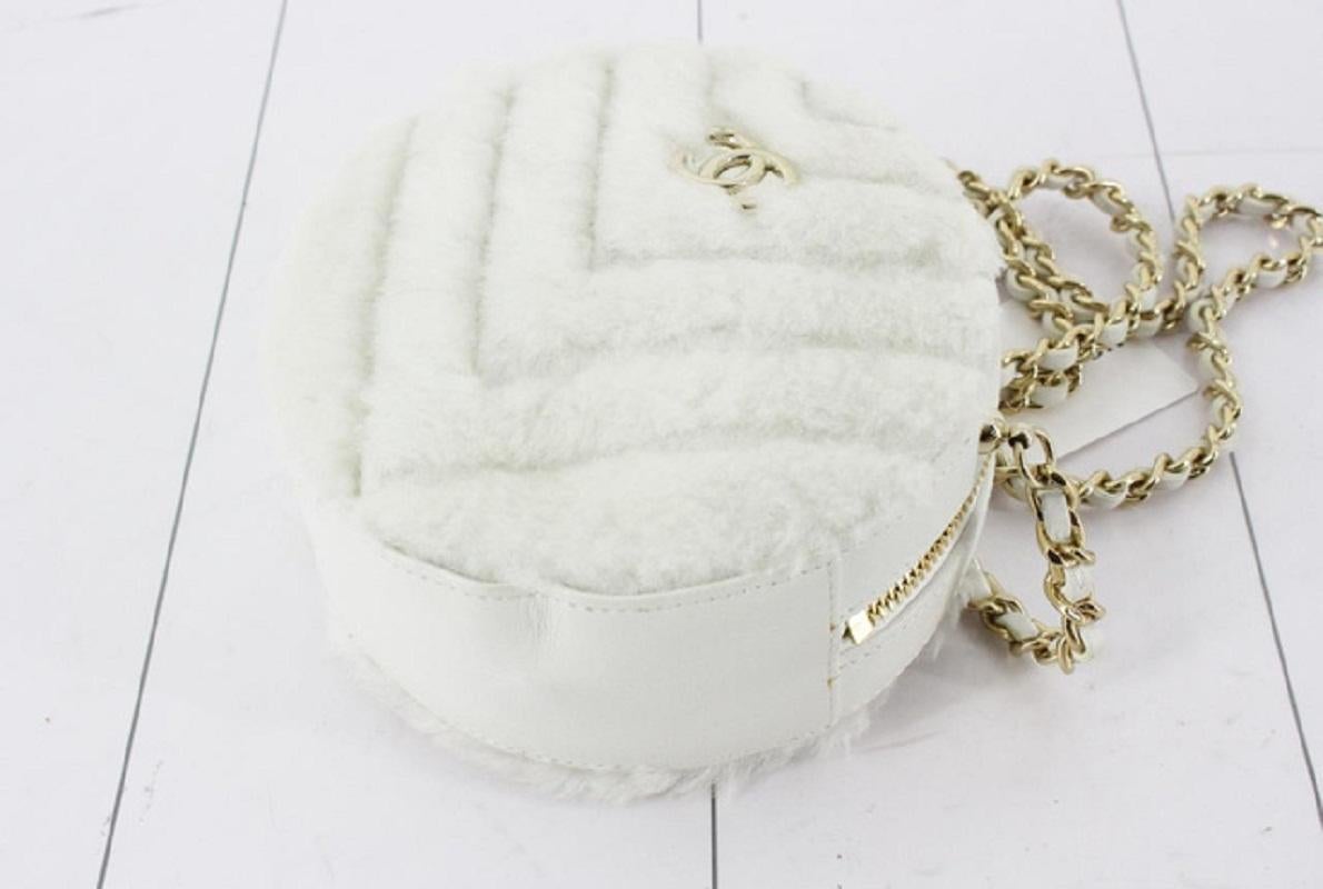 Chanel White Chevron Quilted Fur Round Crossbody Bag In Good Condition In Irvine, CA