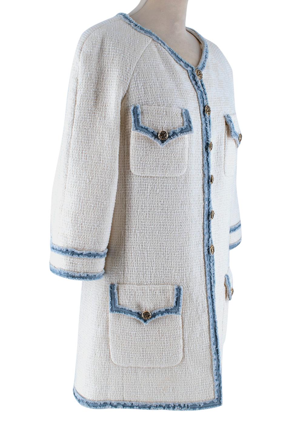 Chanel White Cotton Blend Tweed Denim Trimmed Long Line Jacket 

-Signature tweed fabric
-Gorgeous denim frayed trims 
-Iconic CC logo branded golden buttons 
-Luxurious silk lining, depicting Camellias, Chanels favorite flower 
-Round neckline