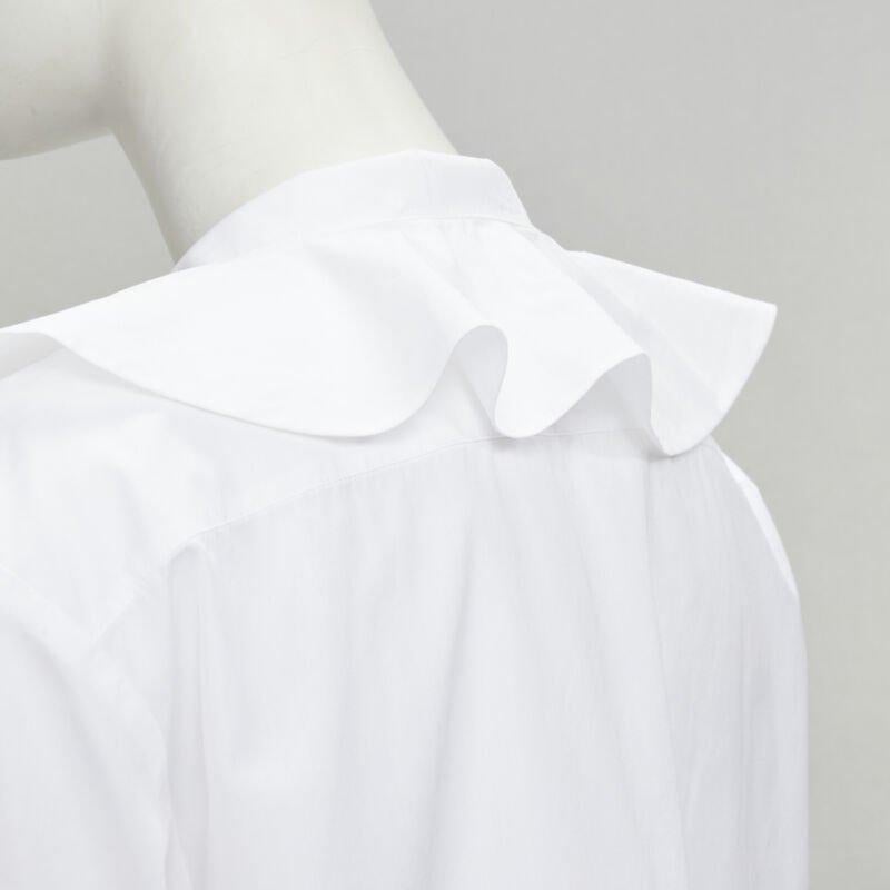 CHANEL white cotton gold pearl CC button double pocket boxy cropped shirt FR40 M
Reference: KNLM/A00010
Brand: Chanel
Designer: Karl Lagerfeld
Model: P62022V11472
Material: Cotton
Color: White
Pattern: Solid
Closure: Button
Extra Details: Gold-tone