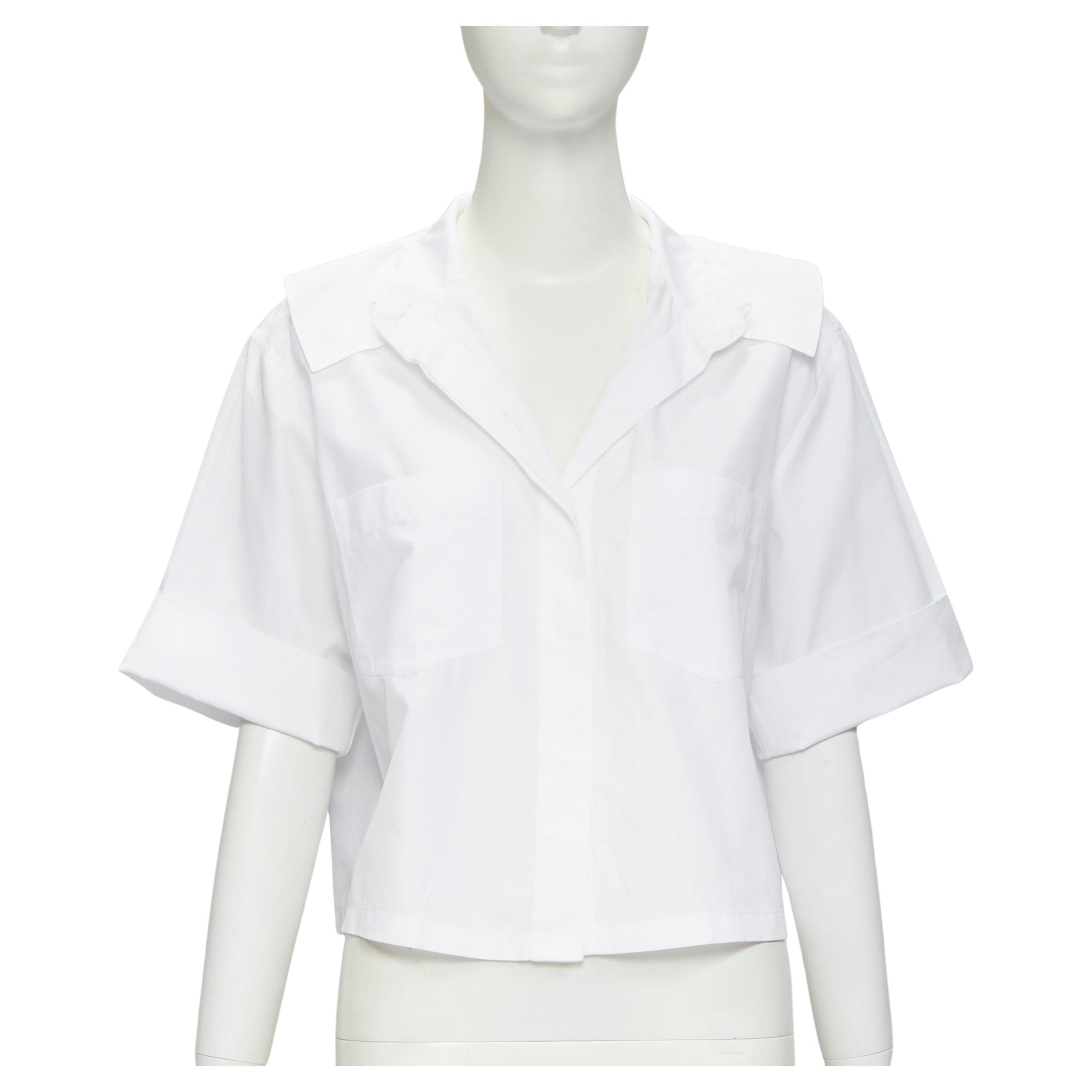 CHANEL white cotton gold pearl CC button double pocket boxy cropped shirt FR40 M For Sale
