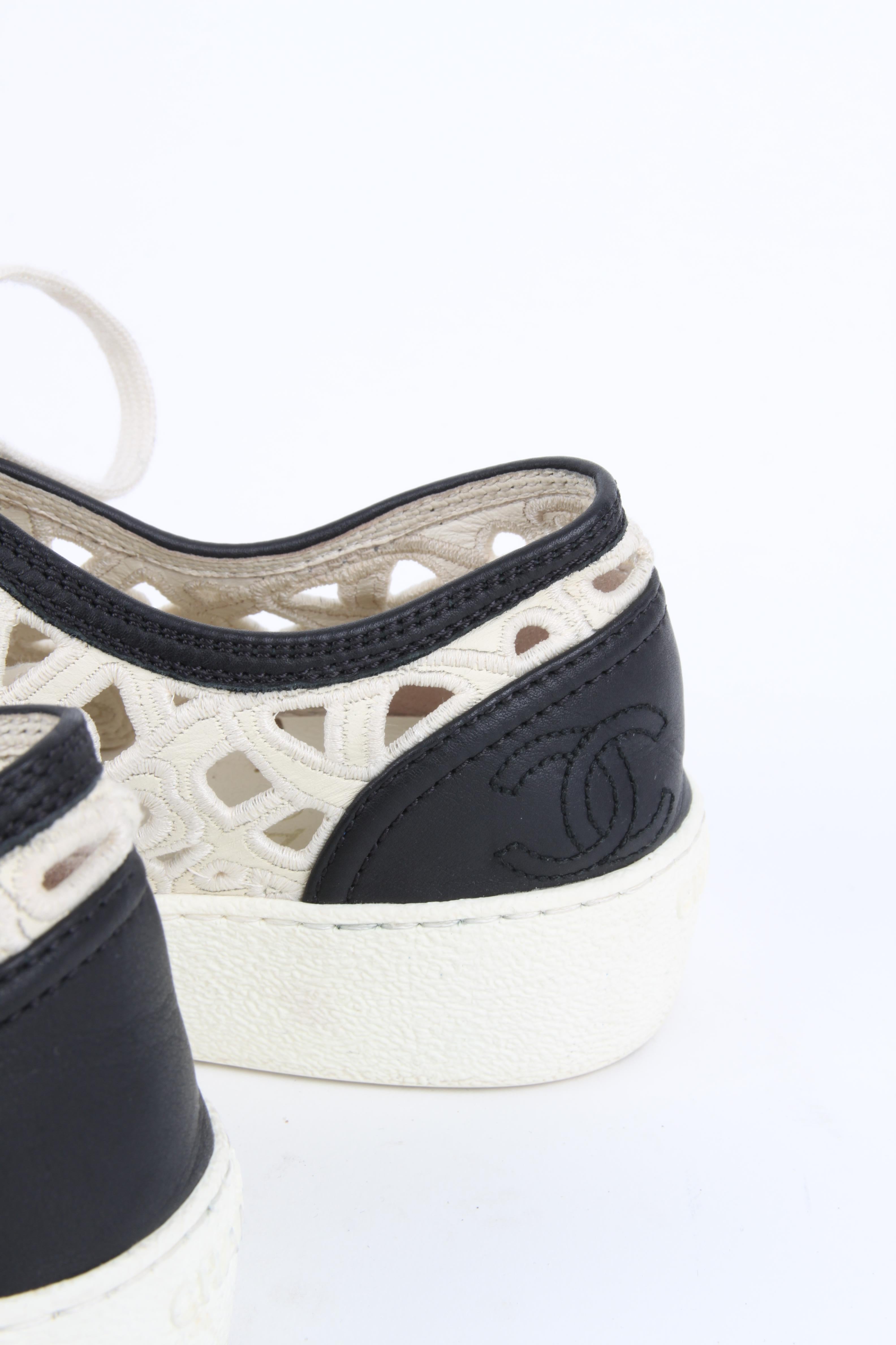 Women's or Men's Chanel white cotton laser cut open-work CC logo and camelia low-top sneakers