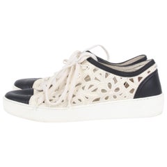 Chanel white cotton laser cut open-work CC logo and camelia low-top sneakers