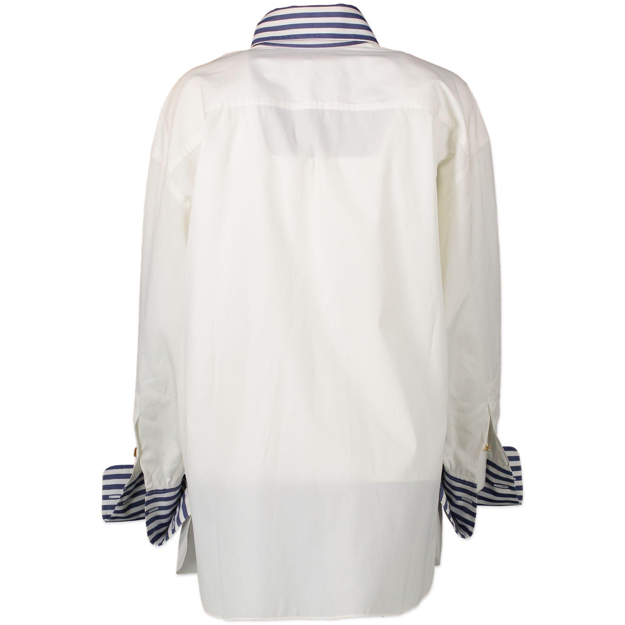 Very good condition

Chanel White Cotton Nautical-Inspired Button-Down Shirt

Be ready for a stroll on the boardwalk or a trip to the harbour - Saint Tropez style! This nautical inspired shirt by Chanel features gold-toned buttons, cufflink sleeves