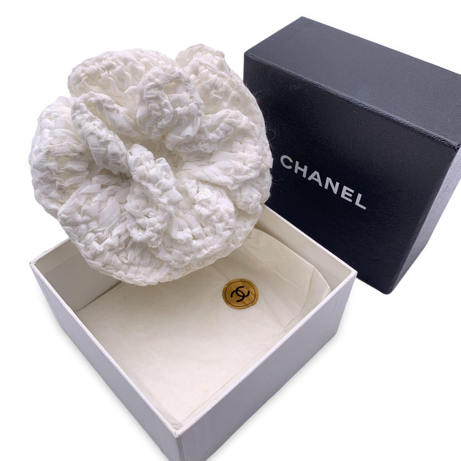 Lovely vintage CHANEL Crochet Camellia Brooch in white color. 'Chanel CC Made in France' oval tab on the back. Flower width 4.5 inches -11.5 cm Condition A - EXCELLENT Gently used. Chanel box included. Please check the photos carefully and ask if