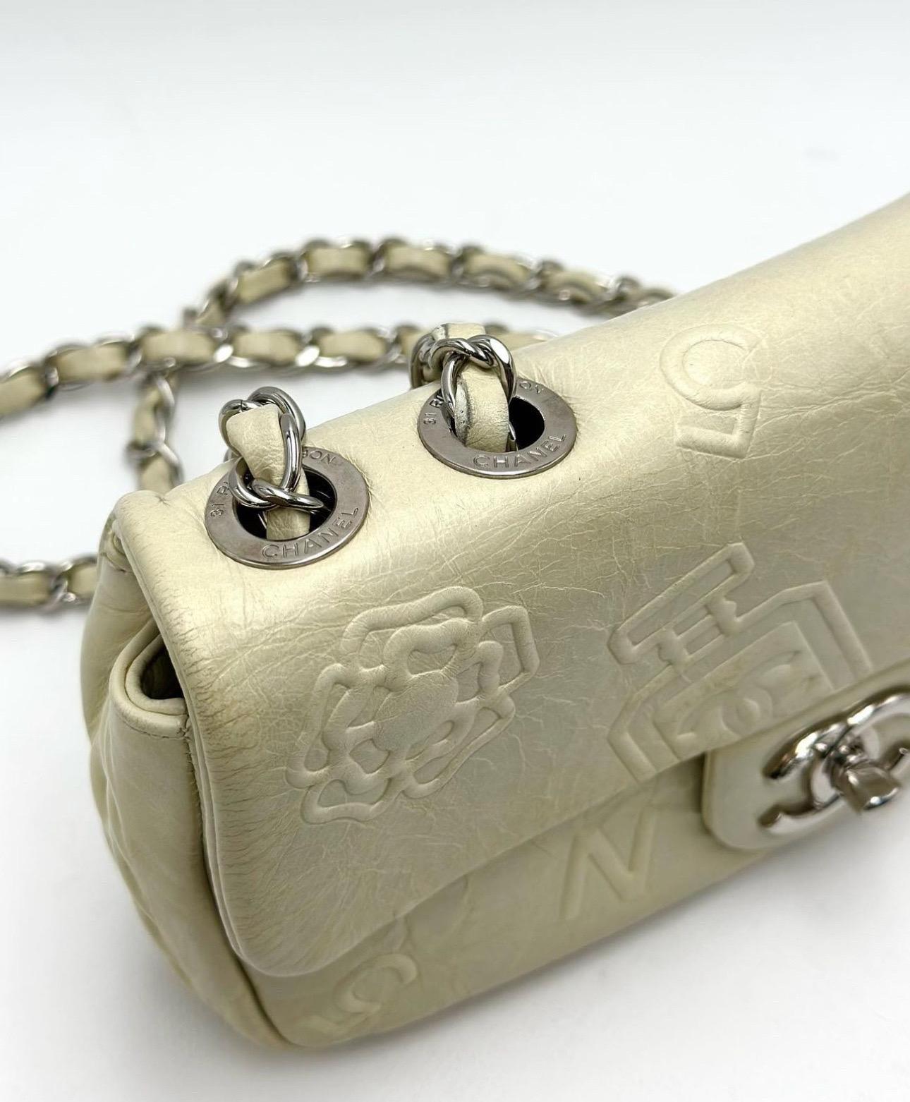 Chanel White Embossed Leather Precious Symbols Small Flap Bag For Sale 13