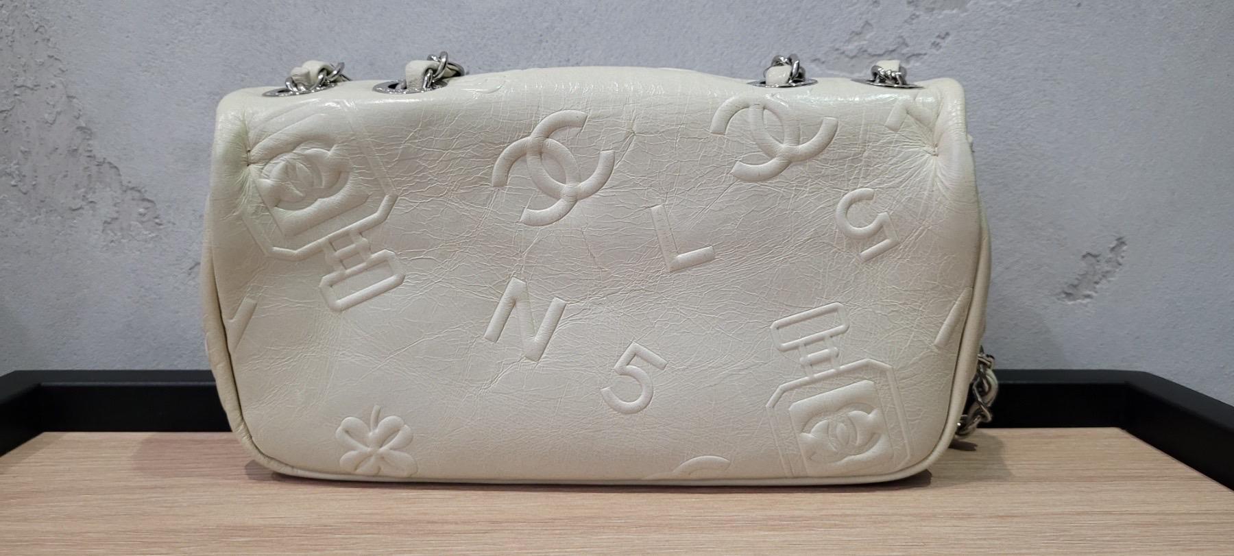 Women's Chanel White Embossed Leather Precious Symbols Small Flap Bag For Sale