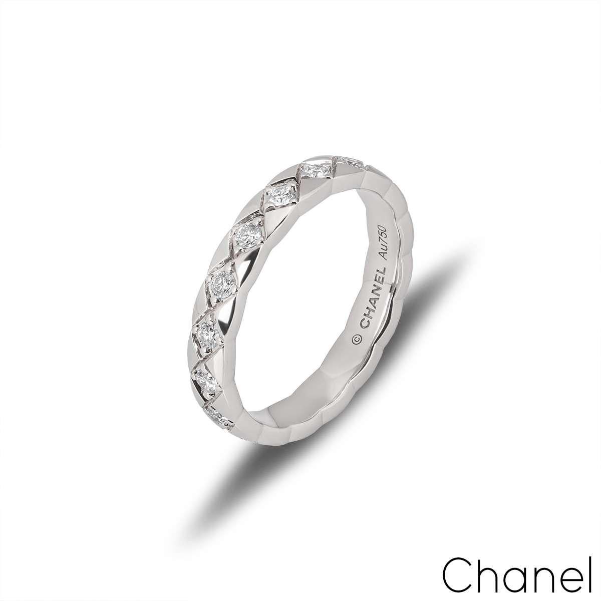 An 18k white gold ring from the Coco Crush collection by Chanel. The ring features a quilted pattern with round brilliant cut diamonds set throughout the ring. The diamonds have a total weight of 0.37ct. The ring measures 3mm in width, is a size UK