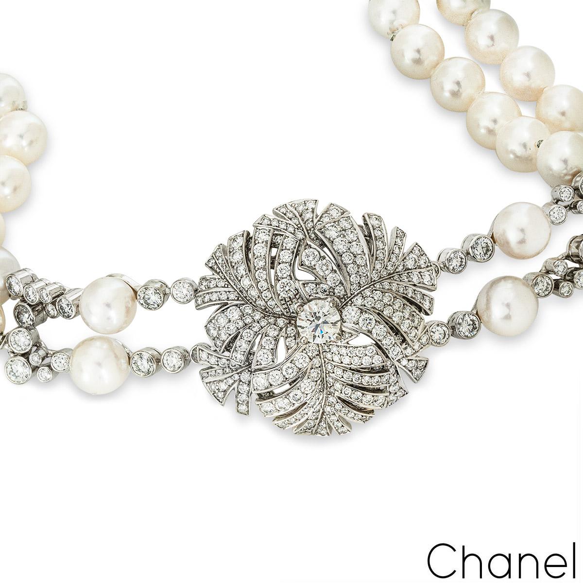 A beautiful 18k white gold diamond and pearl Chanel bracelet from the Panache collection. The bracelet comprises of a floral motif set to the centre with a 0.53ct round brilliant cut diamond in a 4 claw setting in the middle of the star, F colour