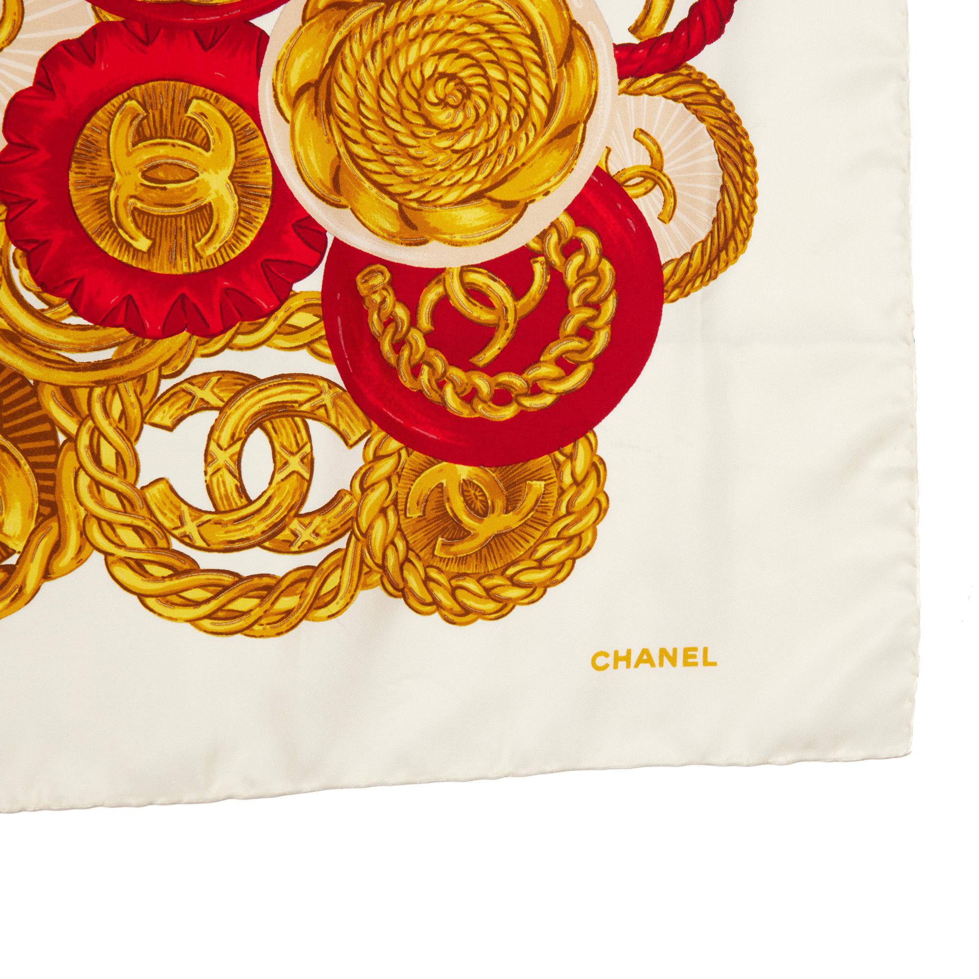 CHANEL WHITE, GOLD & RED SILK VINTAGE MEDALLION COIN CHAIN PRINT SCARF

CONDITION NOTES
The exterior is in excellent condition with minimal signs of use.
Overall this item is in excellent pre-owned condition. Please note the majority of the items we