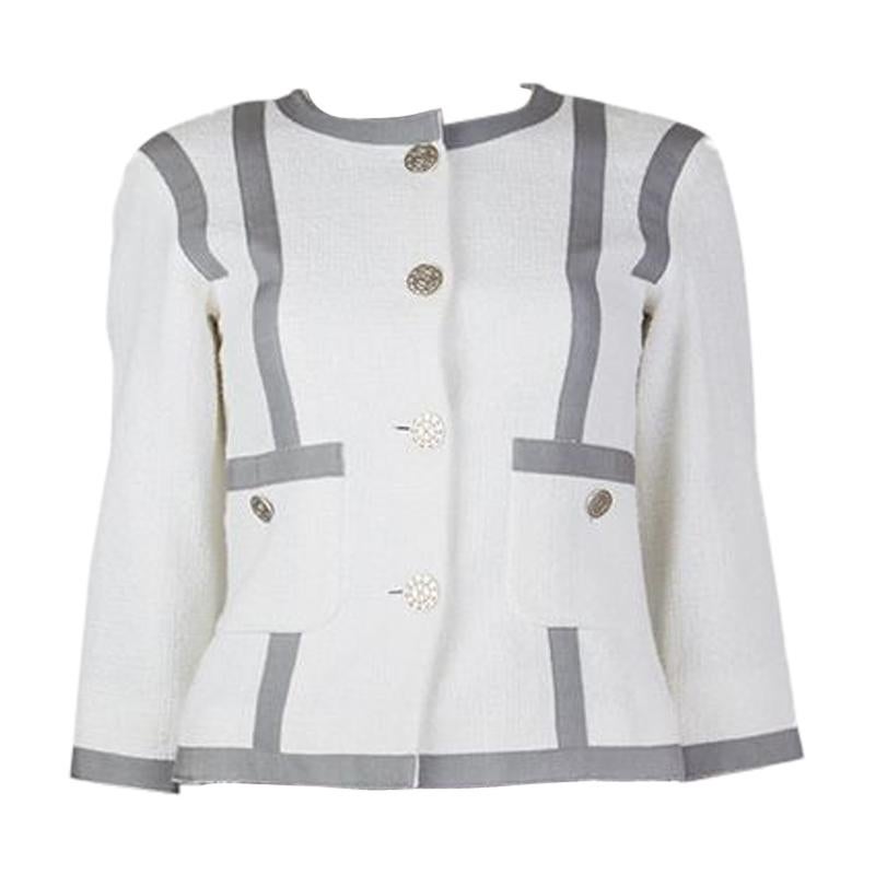 white collarless jacket