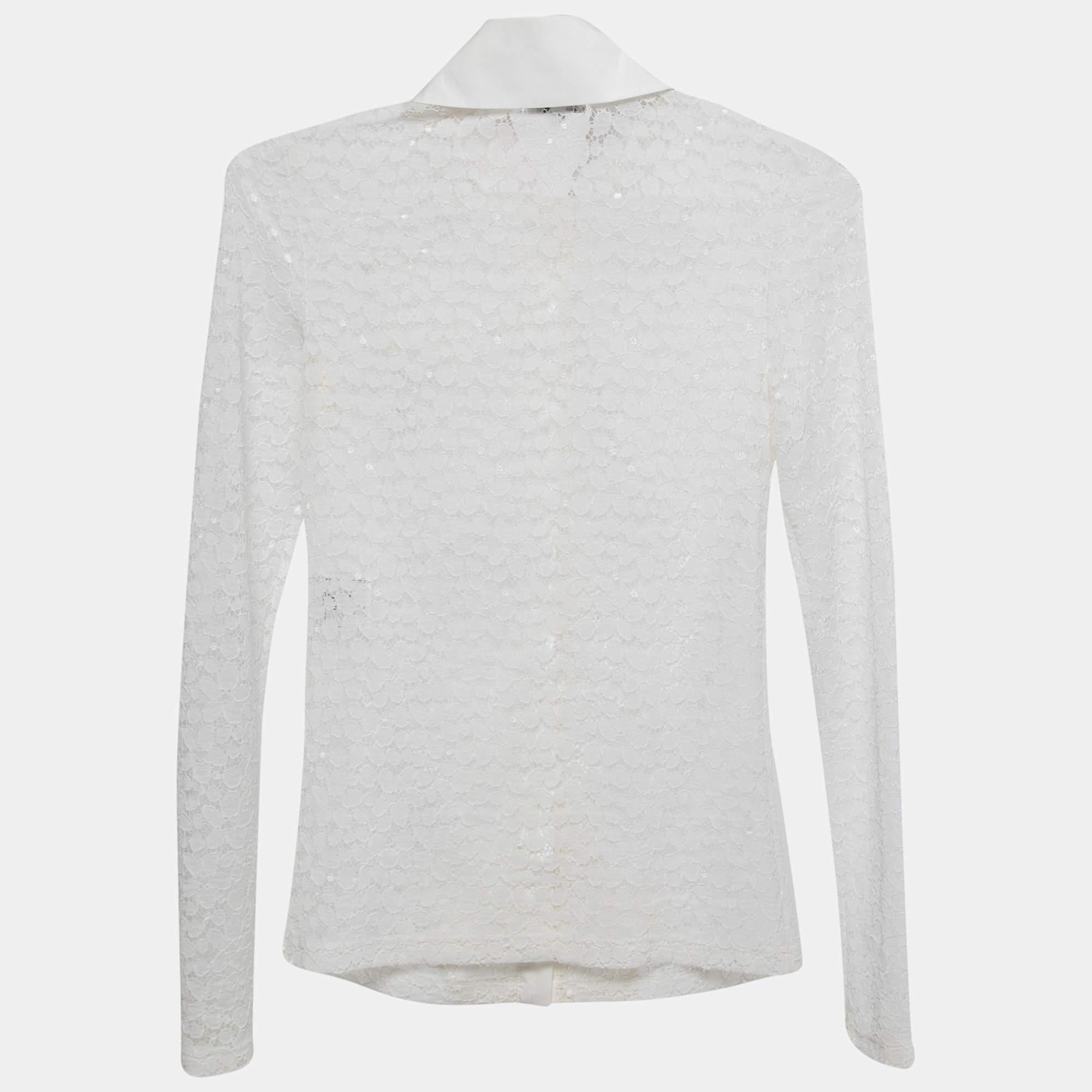 This Chanel blouse features charming ruffles cascading along the neckline and sleeves, adding a touch of femininity. With its exquisite craftsmanship and classic design, this blouse is perfect for creating sophisticated and romantic looks.

