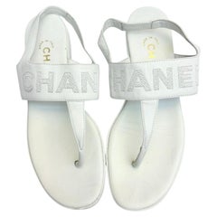 Chanel white lambskin stitching "CHANEL" sandals