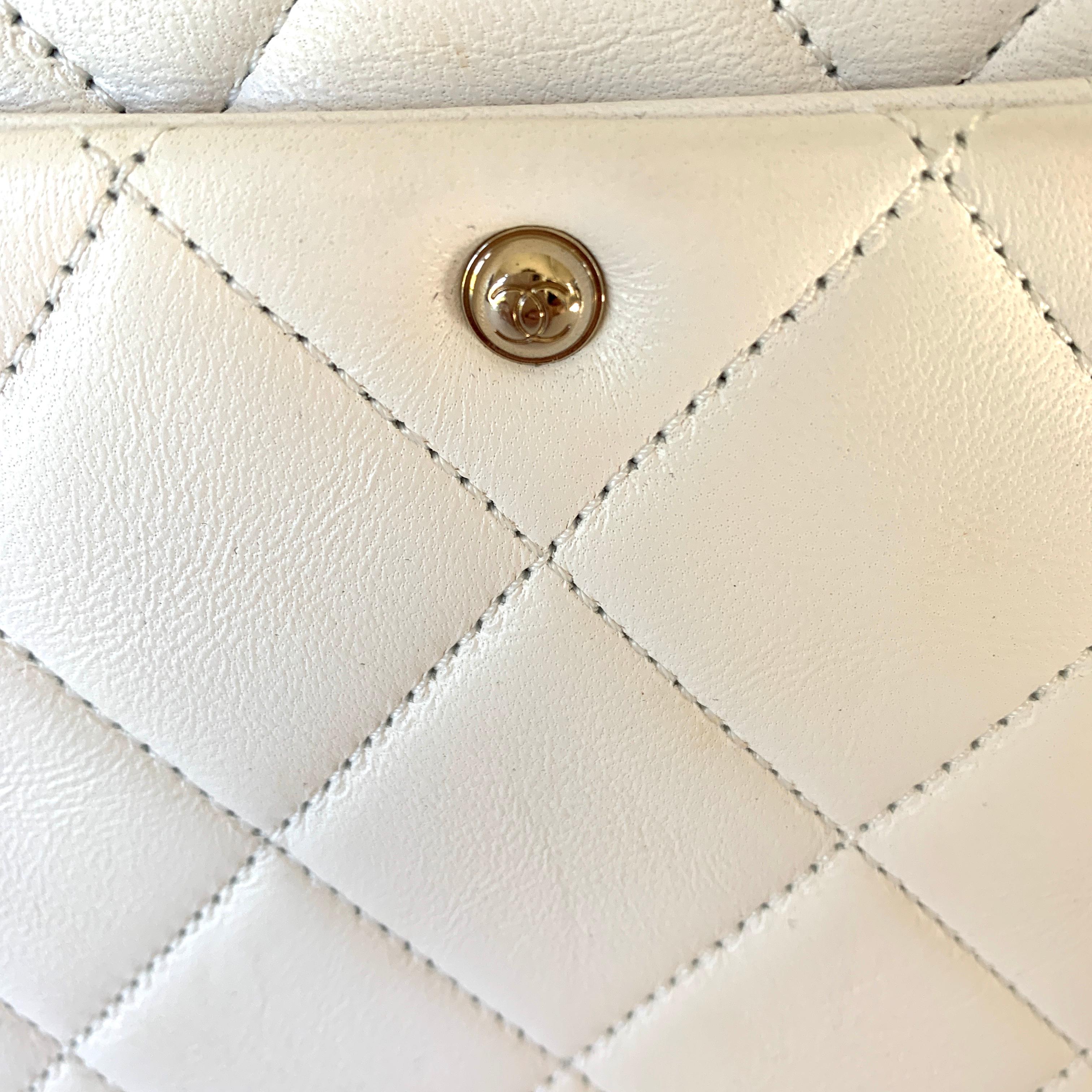 white chanel bag with gold chain