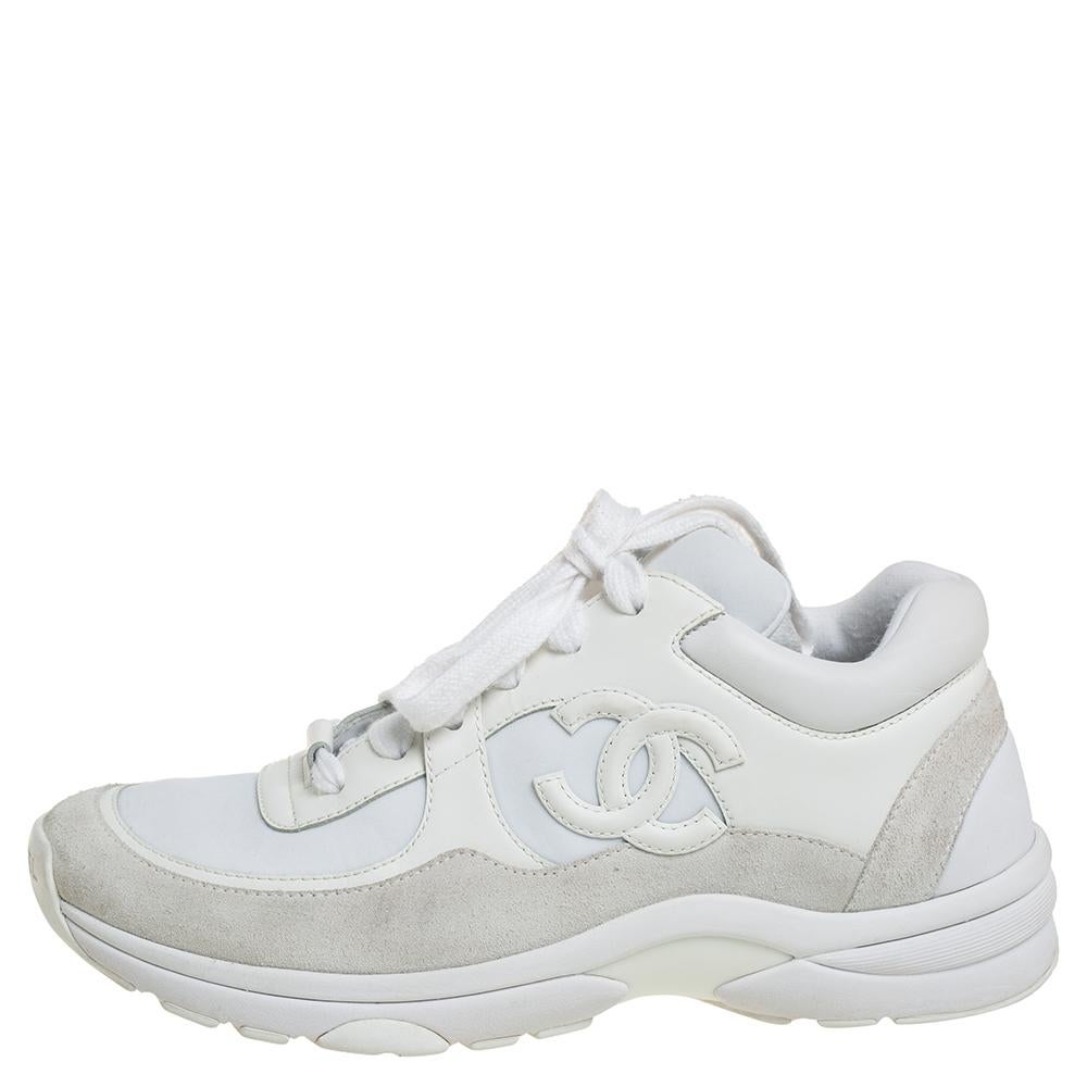 Add a touch of luxury to your casual-sporty look with these stunning Chanel sneakers. Beautifully constructed with leather, suede, and neoprene, they feature rounded toes, the CC logo on the sides, and semi-chunky rubber outsoles. The lace-ups