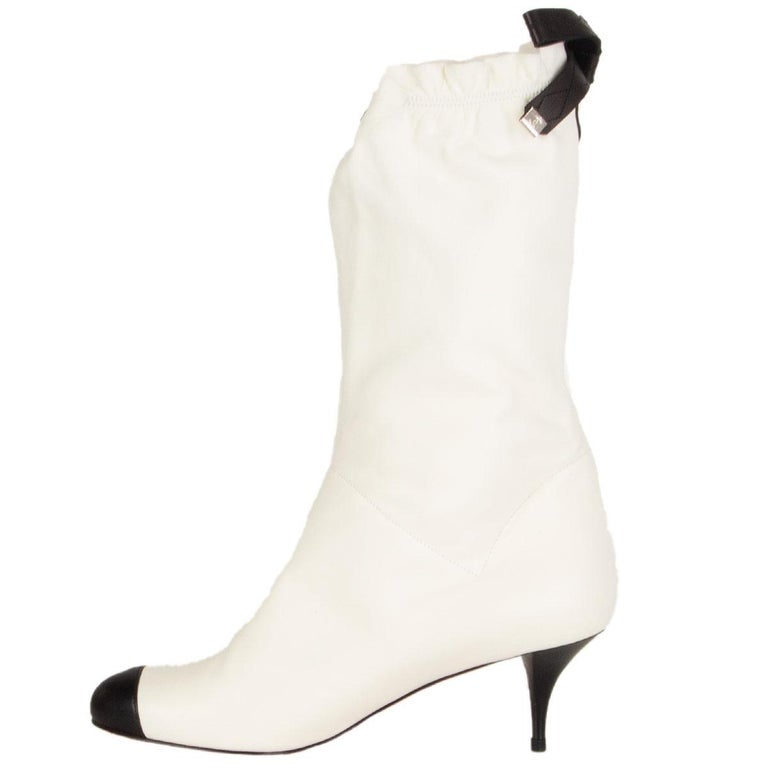CHANEL white leather BLACK BOW Mid-Calf Boots Shoes 37.5 at 1stDibs  chanel  black and white boots, chanel bow boots, chanel white boots black toe