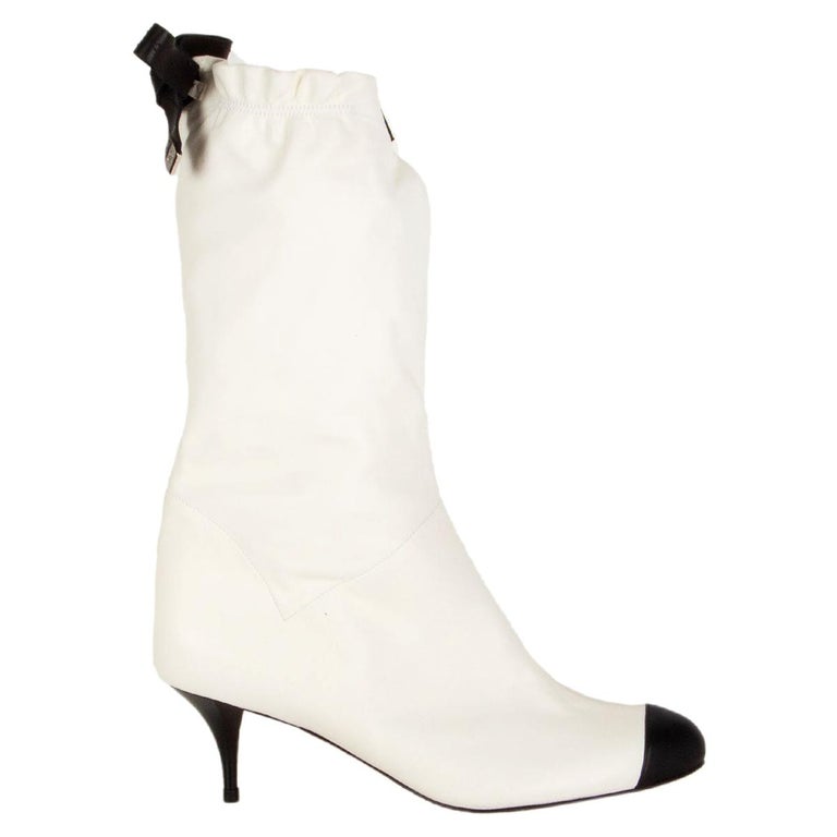 CHANEL white leather BLACK BOW Mid-Calf Boots Shoes 37.5 at 1stDibs  chanel  black and white boots, chanel bow boots, chanel white boots black toe
