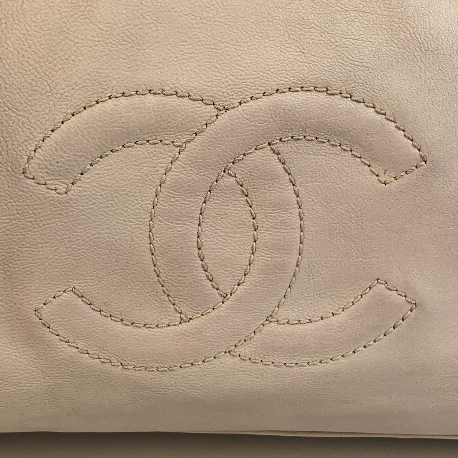 white leather duffle bag