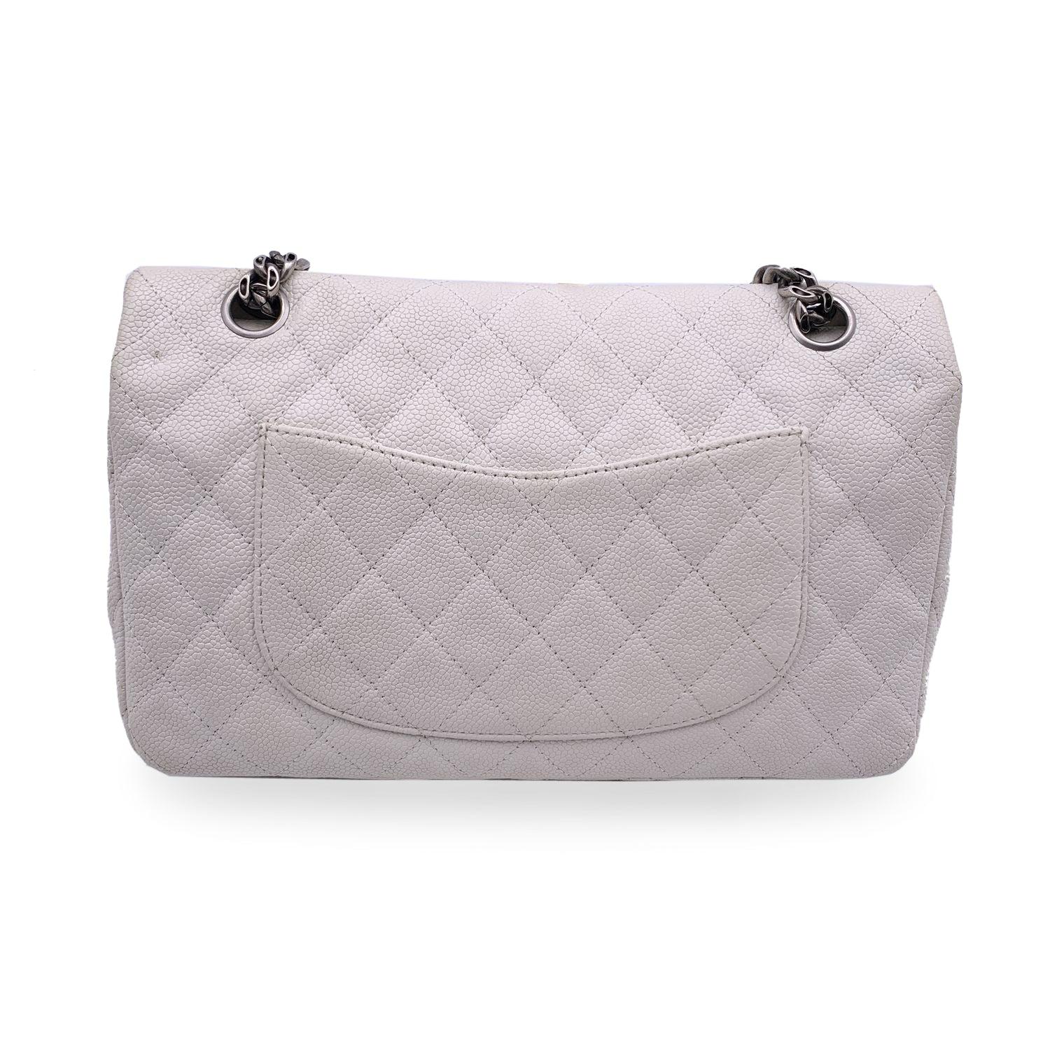 This beautiful Bag will come with a Certificate of Authenticity provided by Entrupy. The certificate will be provided at no further cost Beautiful Chanel '2.55 Reissue - 225 Medium' Shoulder Bag. Period/Era:2007-2008. The bag is crafted in white