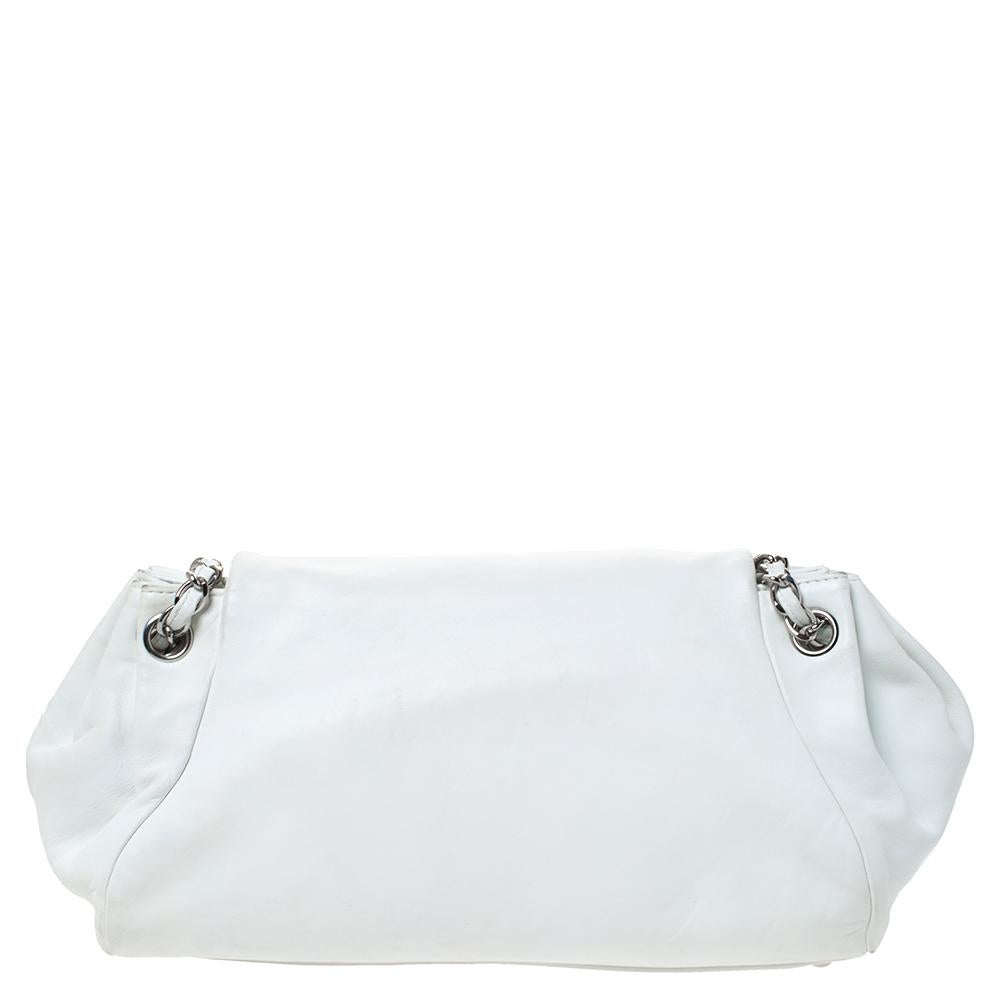 Charm your way through every gathering by swinging this Sensual Accordion flap bag from Chanel. Crafted from quality leather, the bag has a classic white exterior with a flap that has the signature CC and it reveals a spacious leather-lined interior