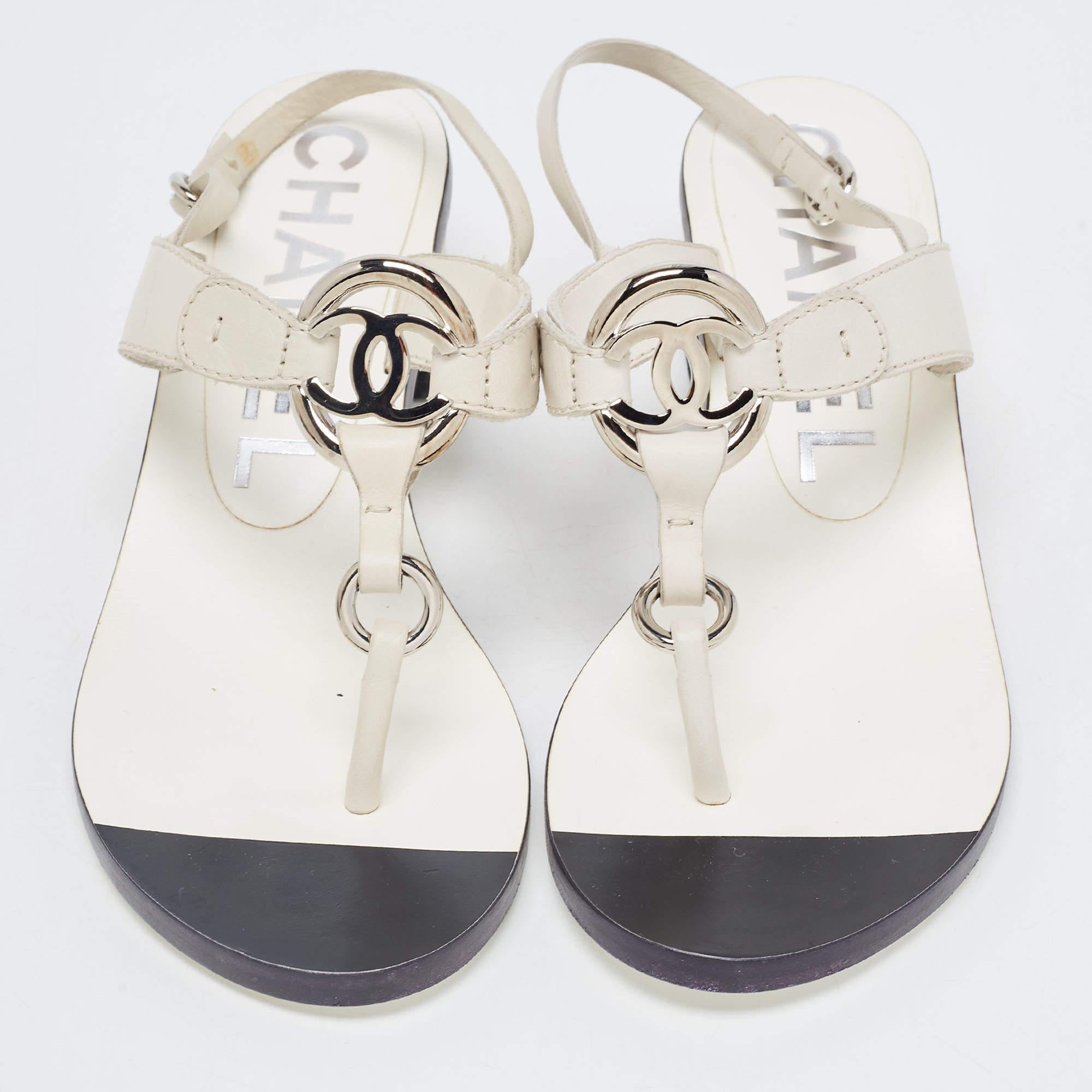 These Chanel sandals will offer you both luxury and comfort. Made from quality materials, they come in a classy white shade and are equipped with comfortable insoles.

Includes
Original Box, Original Dustbag