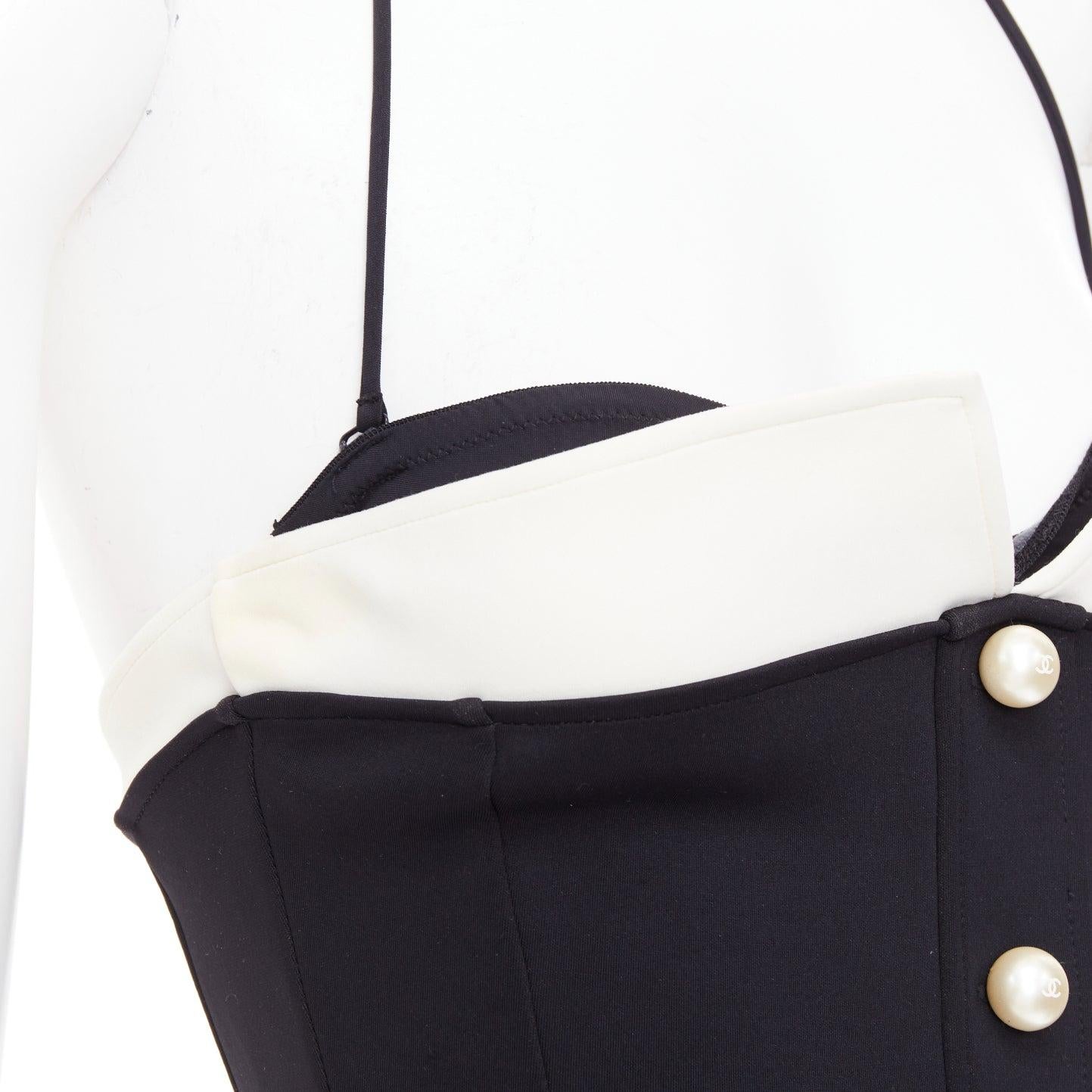 Chanel logo blanc fausse perle noir blanc maillot de bain une pièce dos nu FR34 XS
Référence : GEGG/A00188
Marque : Chanel
Designer : Virginie Viard
Matière : Polyamide, mélange
Couleur : Noir, Crème
Motif : Solide
Fermeture : élastique
Doublure :
