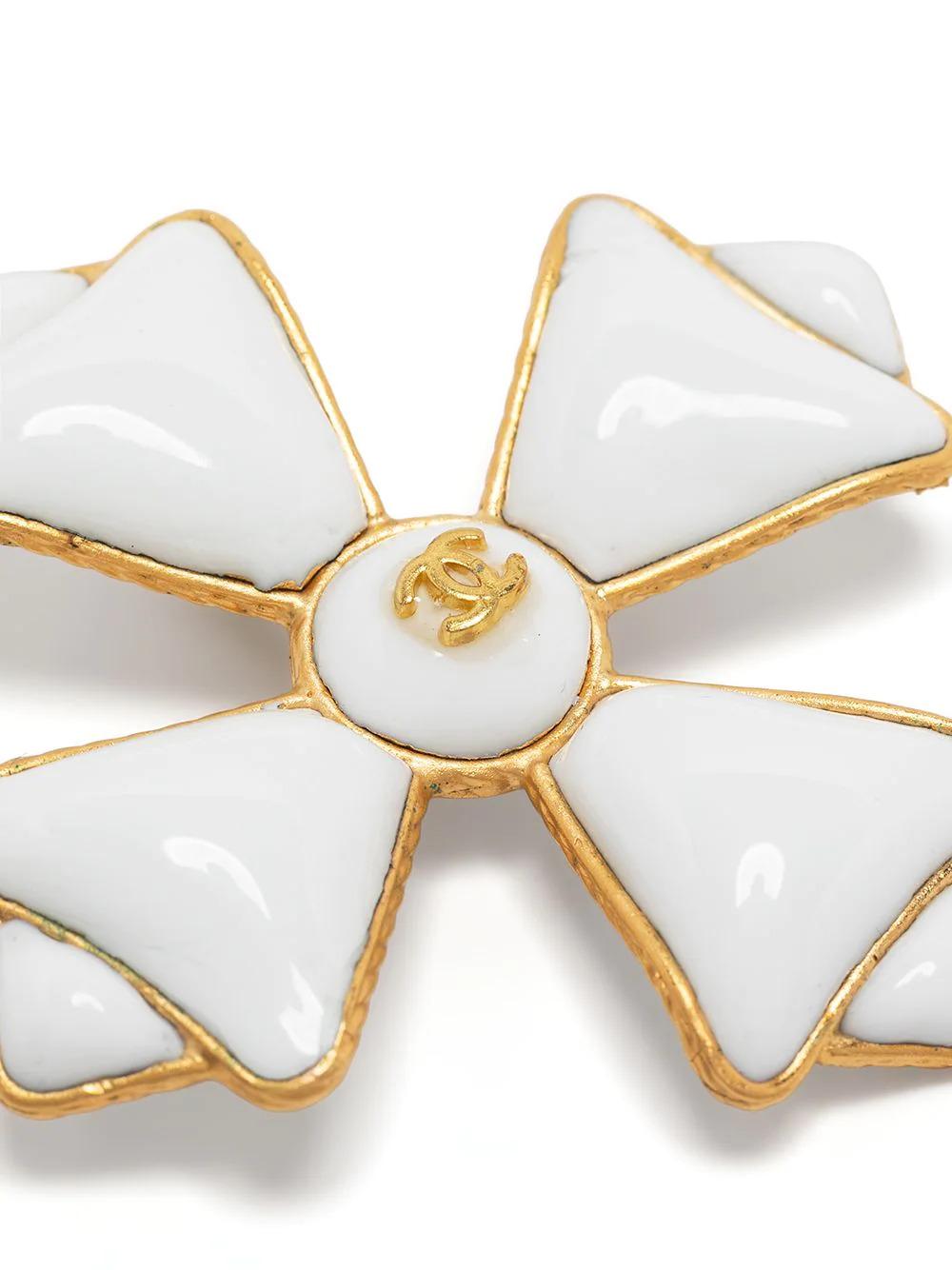 Sometimes referred to as the Amalfi cross, the maltese cross became an iconic symbol that appears across many of Chanel's designs. Created by Fulco di Verdura for Coco Chanel, the maltese cross was an interpretation of the star of the knights.
