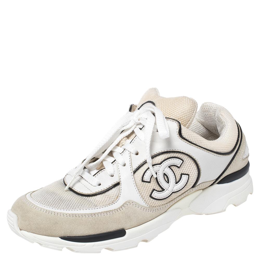 Look your stylish best every time you step out wearing these low-top Chanel sneakers. Crafted from quality mesh, suede & leather, these sneakers feature the iconic CC logo on the sides and lace-ups. They are finished with leather & mesh insoles and