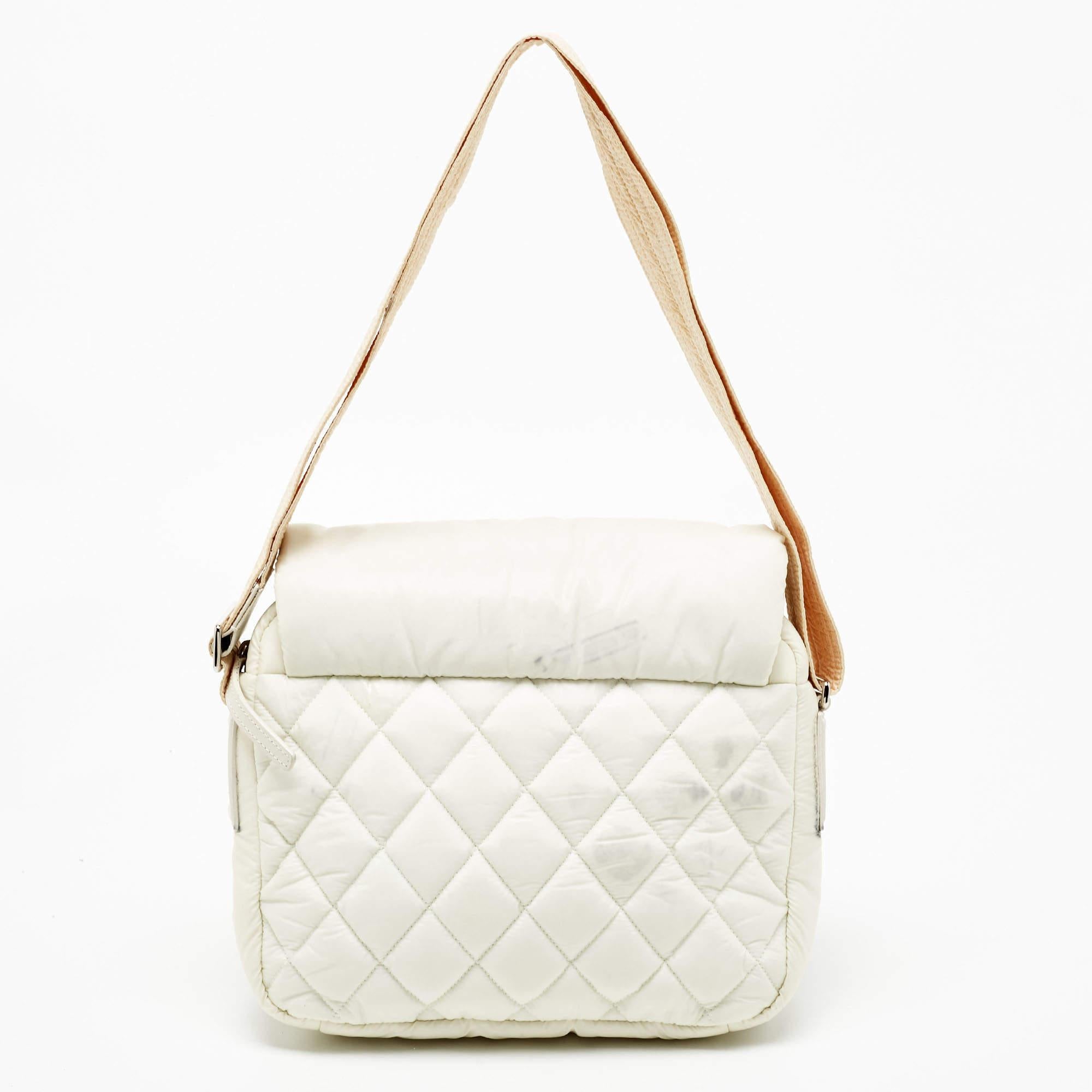 Handbags are more than just instruments to carry one's essentials. They essay one's sense of style, and the better the bag, the more confidence we get when we hold it. This Chanel white Coco Cocoon bag is meticulously made from luxe materials and