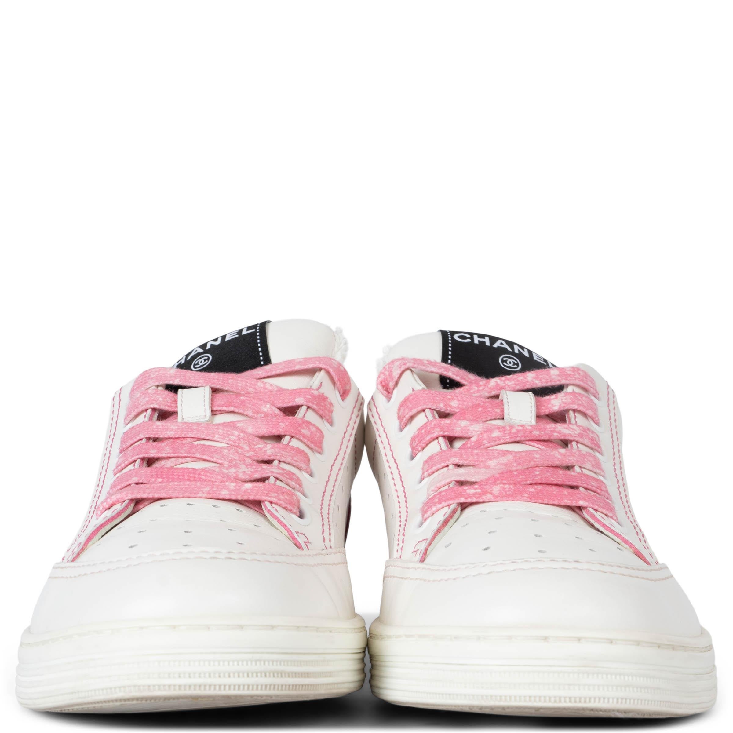 100% authentic Chanel perforated low top sneakers in white leather. Feature pink stitching details and framed logo lettering on the heel. Have been worn and are in excellent condition. 

2021 Pre-Spring

Measurements
Model	21P G35934 X56100