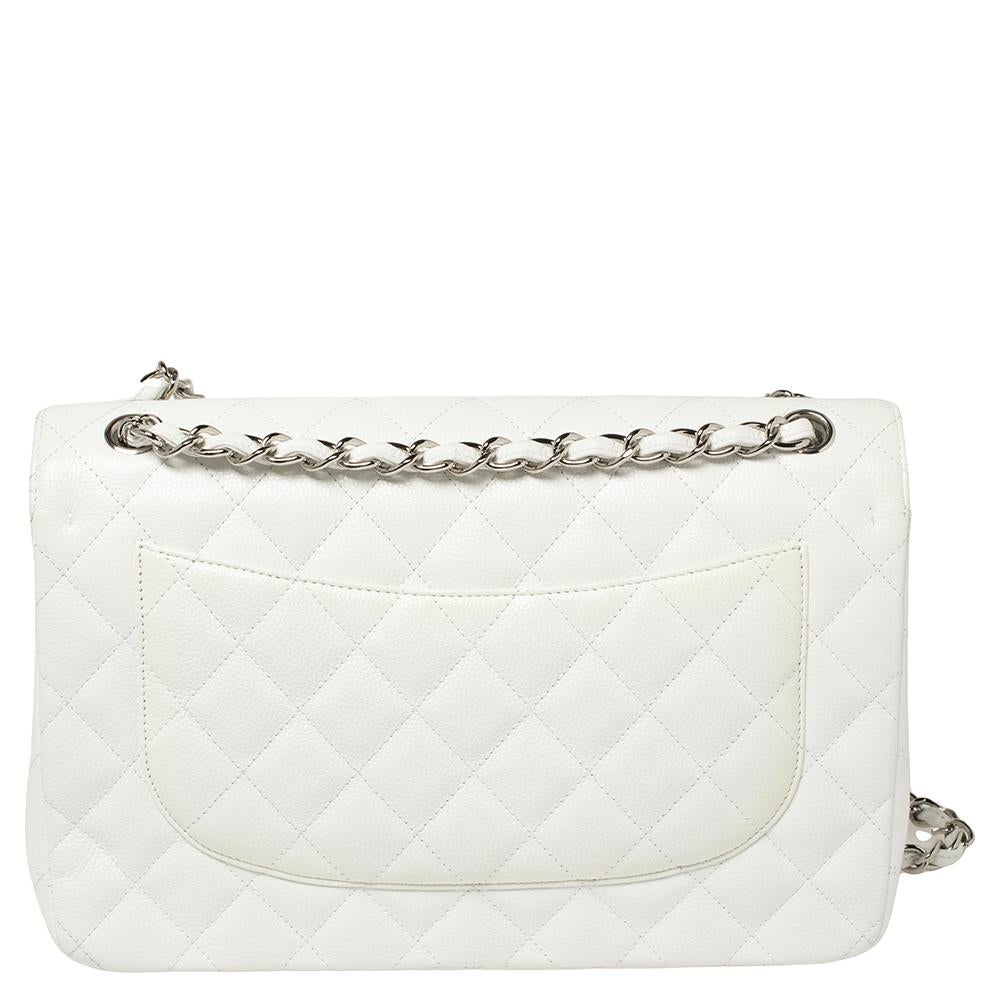 We are in utter awe of this flap bag from Chanel as it is appealing in a surreal way. Exquisitely crafted from leather in their quilt design, it bears their signature label on the leather interior and the iconic CC turn-lock on the flap. The piece