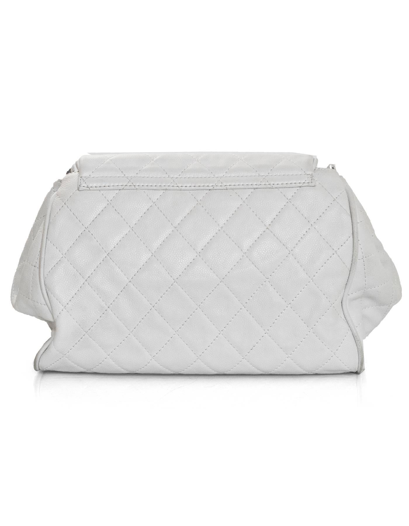 Chanel White Quilted Caviar Timeless Accordion Flap Bag
Features timeless CC stitched on front of flap top

Made In: France
Year of Production: 2008-2009
Color: White
Hardware: Silvertone
Materials: Leather and metal
Lining: White