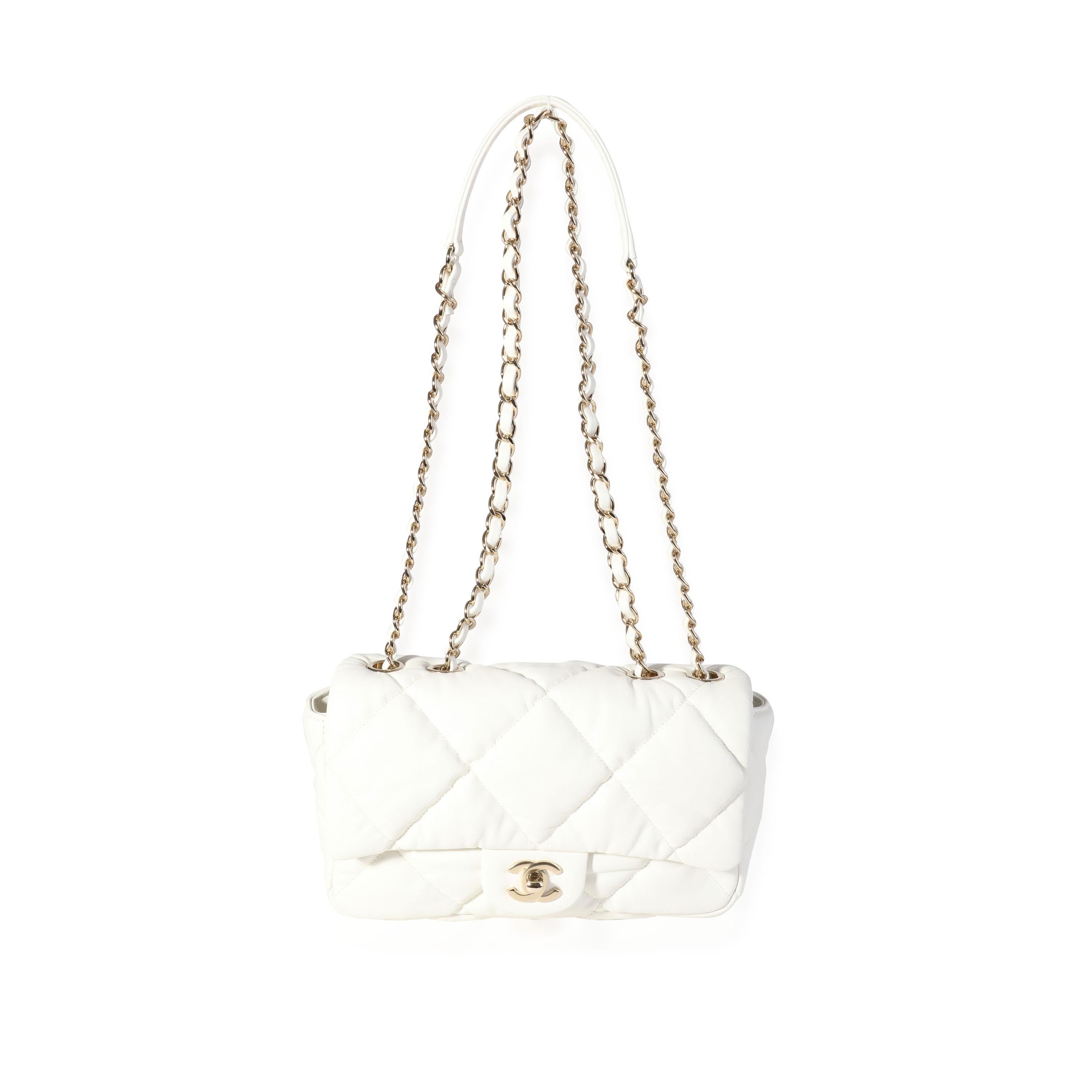 Listing Title: Chanel White Quilted Lambskin Bubble Flap Bag
SKU: 118317
Condition: Pre-owned (3000)
Handbag Condition: Mint
Condition Comments: Mint Condition. Plastic on some hardware. No visible signs of wear. Final sale.
Brand: Chanel
Model: