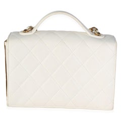 Chanel Mini-Clutch aus weißem, gestepptem Lammleder mit goldener Plakette