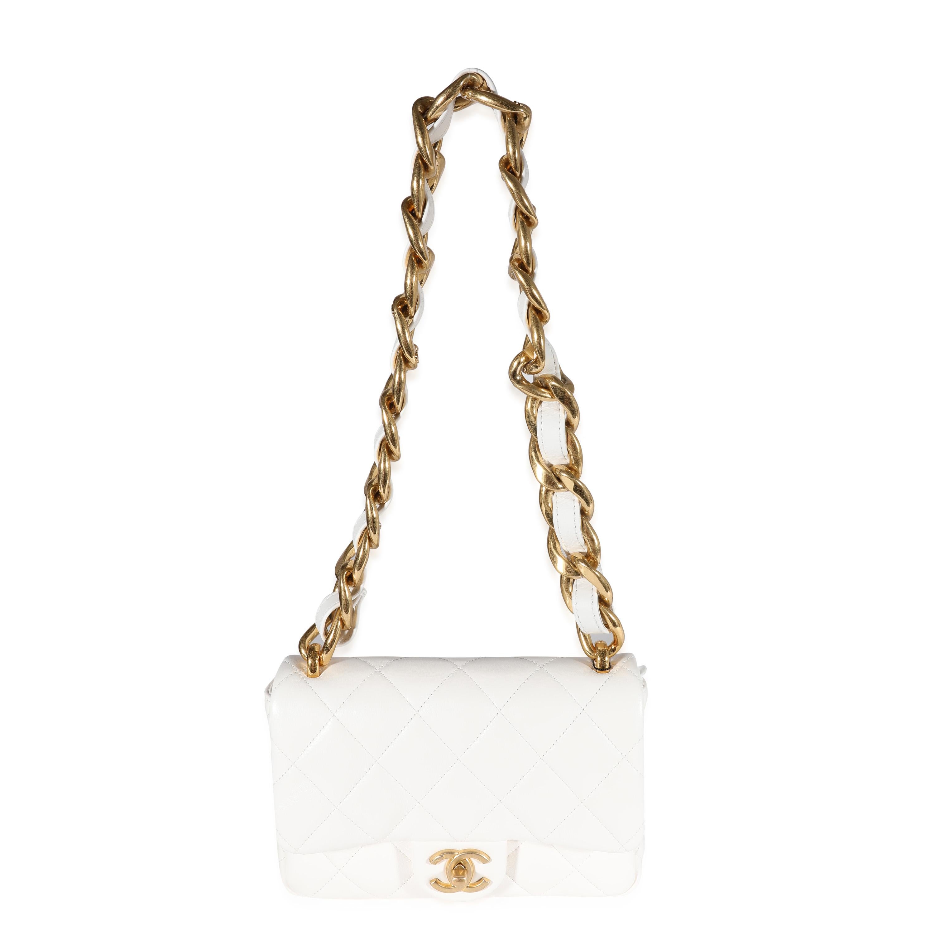 Listing Title: Chanel White Quilted Lambskin Small Funky Town Flap Bag
SKU: 122275
MSRP: 4900.00
Condition: Pre-owned 
Handbag Condition: Excellent
Condition Comments: Excellent Condition. Plastic at some hardware. No visible signs of wear.
Brand: