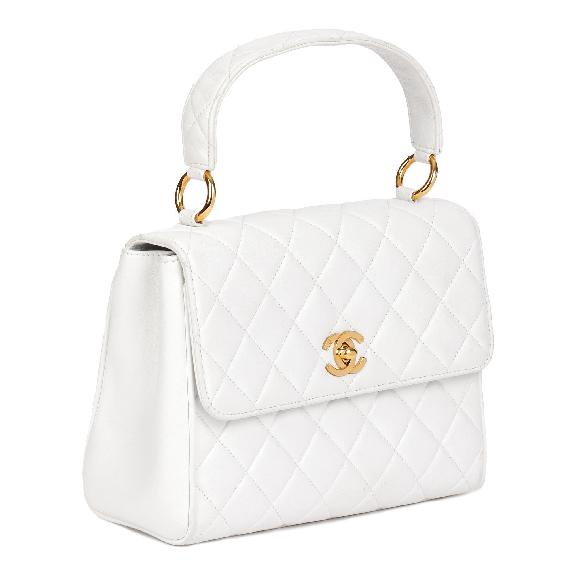 CHANEL
White Quilted Lambskin Vintage Classic Kelly

Serial Number: 4798358
Age (Circa): 1997
Accompanied By: Chanel Dust Bag
Authenticity Details: Serial Sticker (Made in France)
Gender: Ladies
Type: Top Handle

Colour: White
Hardware: Gold (24k