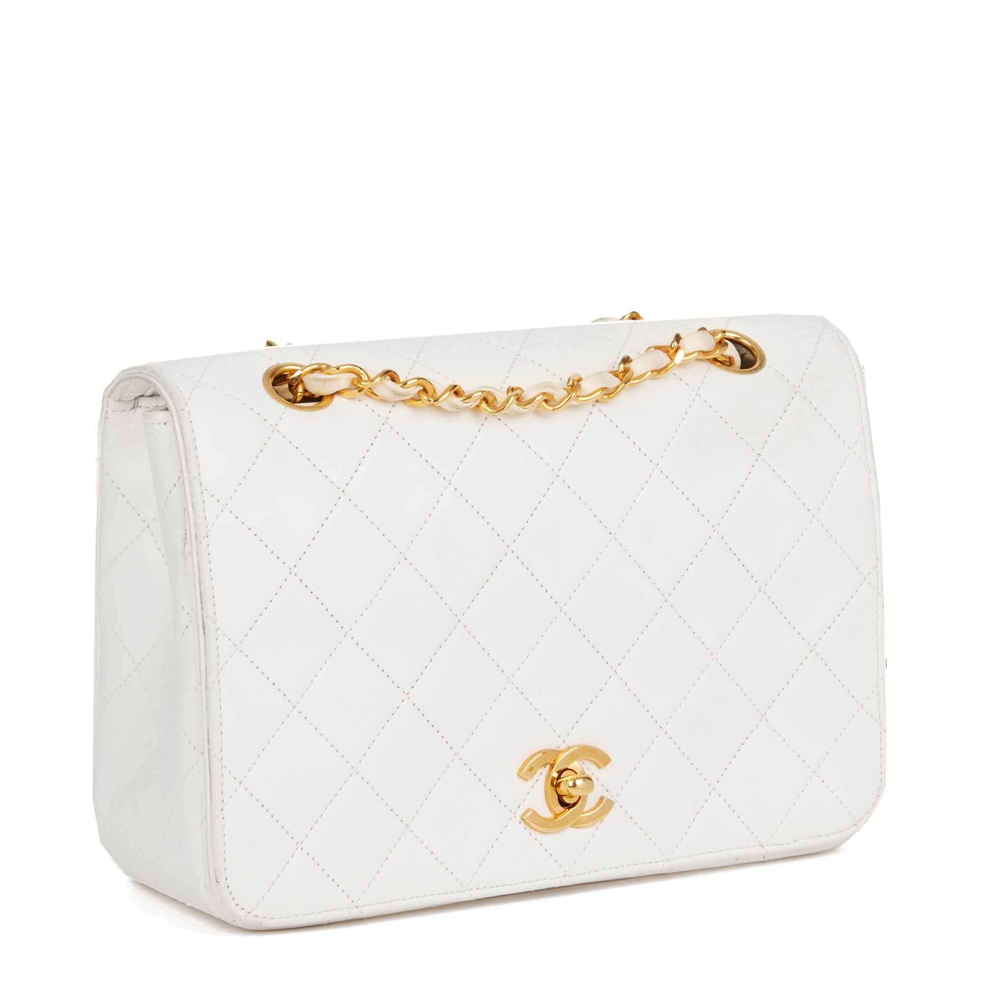 CHANEL
White Quilted Lambskin Vintage Small Classic Single Full Flap Bag 

Xupes Reference: HB4723
Serial Number: 0321169
Age (Circa): 1986
Accompanied By: Chanel Dust Bag, Authenticity Card
Authenticity Details: Authenticity Card, Serial Sticker