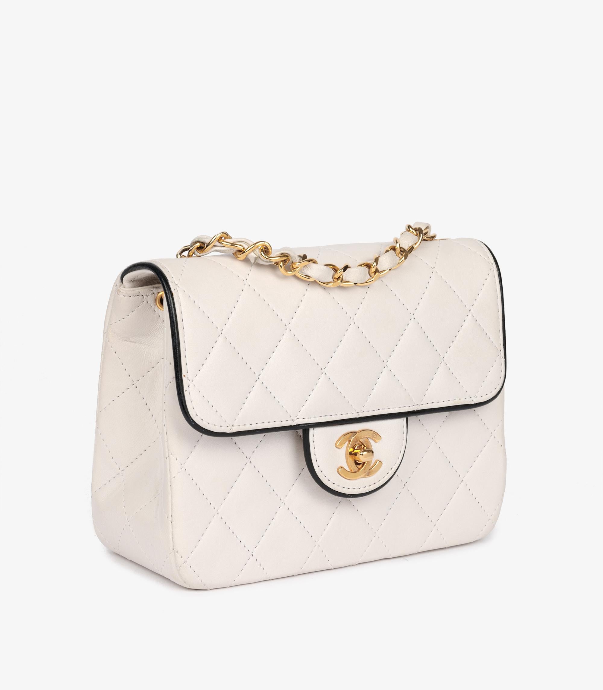 Chanel White Quilted Lambskin With Black Lambskin Leather Trim Vintage Square Mini Flap Bag

Brand- Chanel
Model- Square Mini Flap Bag
Product Type- Crossbody, Shoulder
Serial Number- 1588554
Age- Circa 1989
Accompanied By- Chanel Dust Bag,