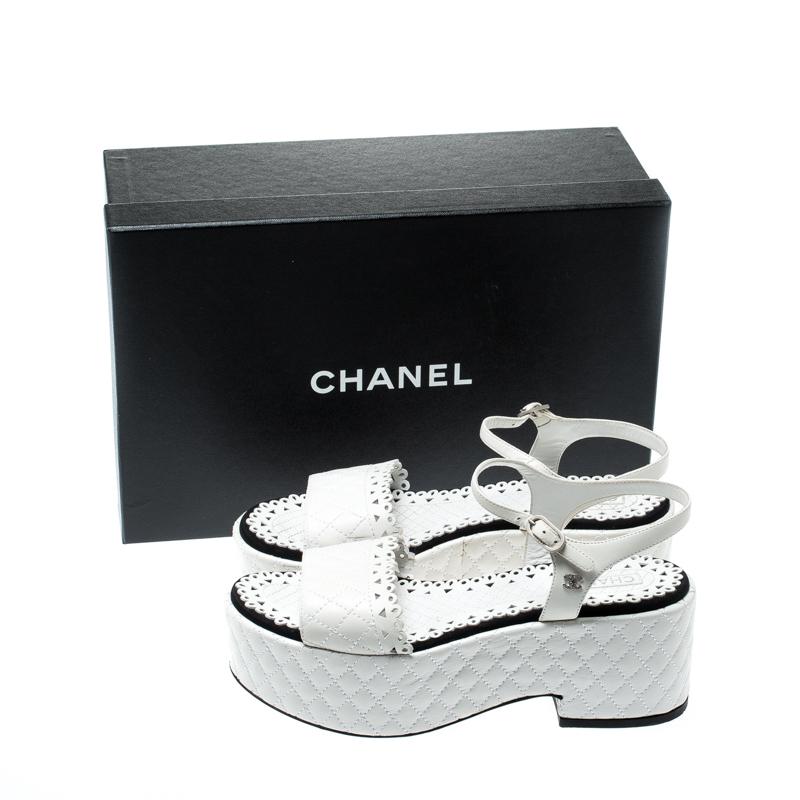 white quilted platform sandals