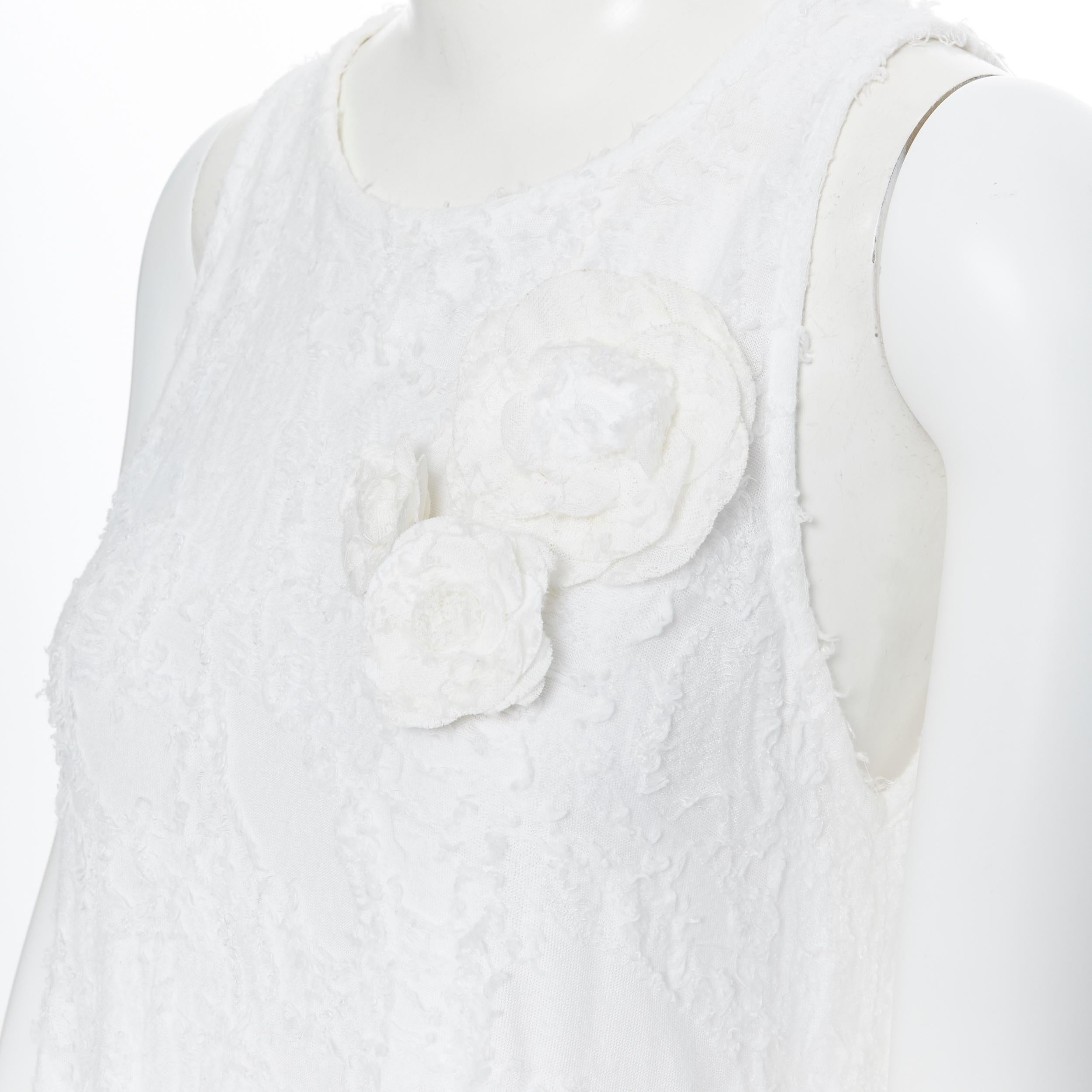 CHANEL white raw frayed cotton trio camellia floral brooch tank top FR36 S 
Brand: Chanel
Designer: Karl Lagerfeld
Model Name / Style: Floral top
Material: Cotton blend
Color: White
Pattern: Solid
Extra Detail: Detachable Camellia floral brooch.