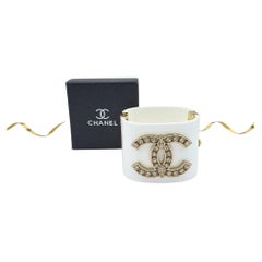 Chanel White Resin CC Logo Cuff Bracelet, Gold-Tone, Rhinestones, 2022
